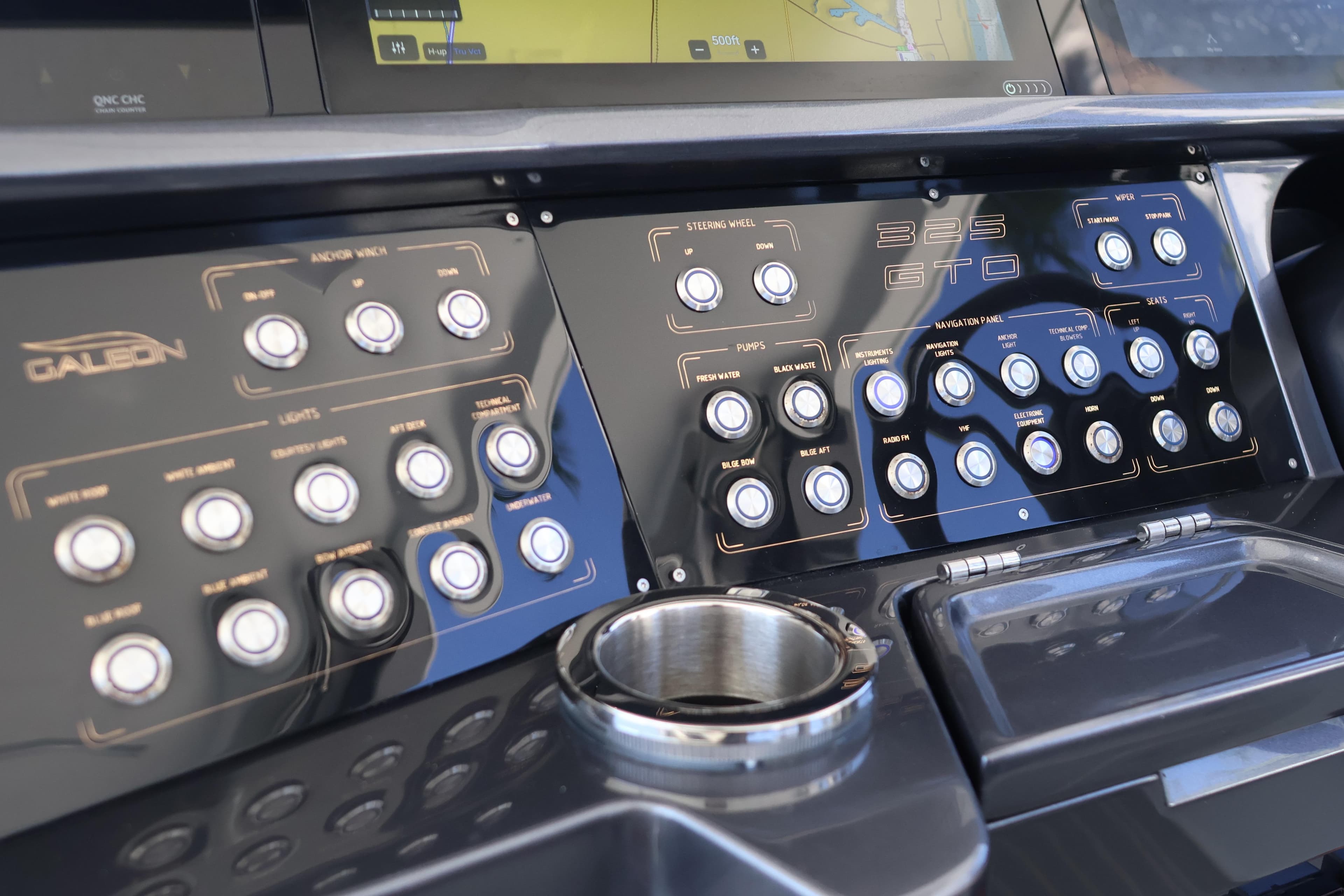 Control panel of 2024 Galeon 325 GTO yacht with various buttons and navigation display.