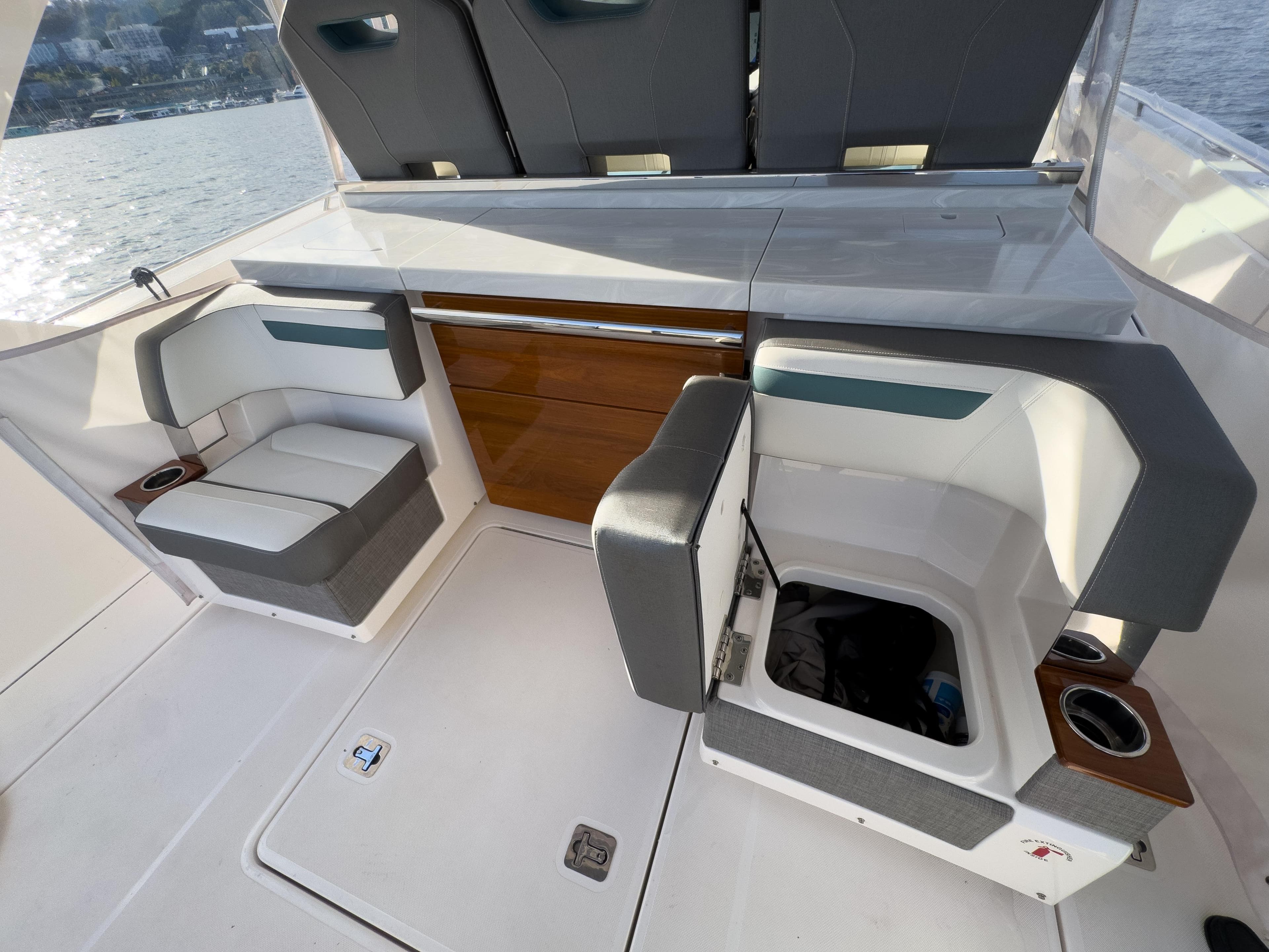2020 Tiara Sport 38 LS boat interior with seating and storage compartments.