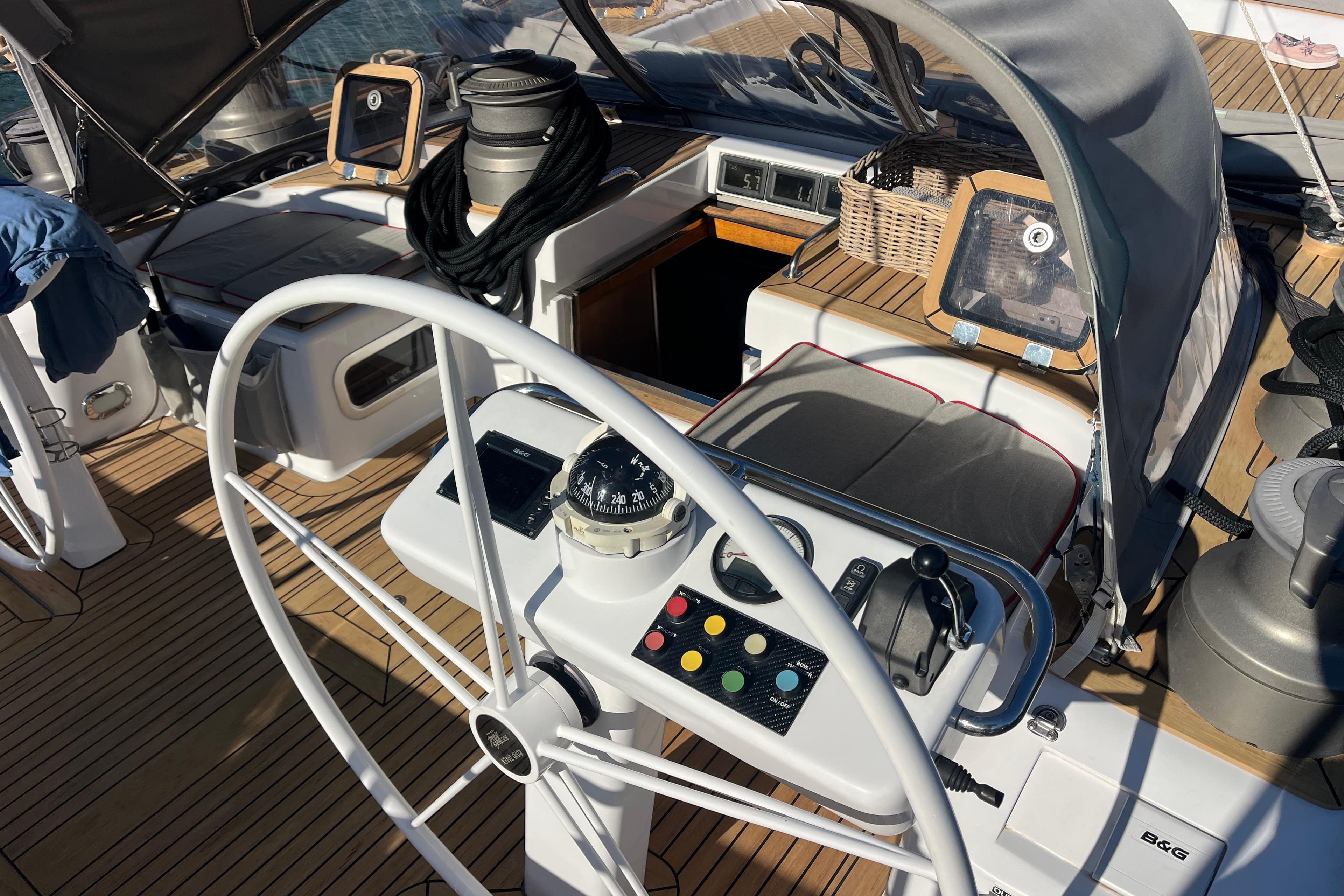 Cockpit of 2003 Southern Wind SW80 yacht with steering wheel and navigation instruments.