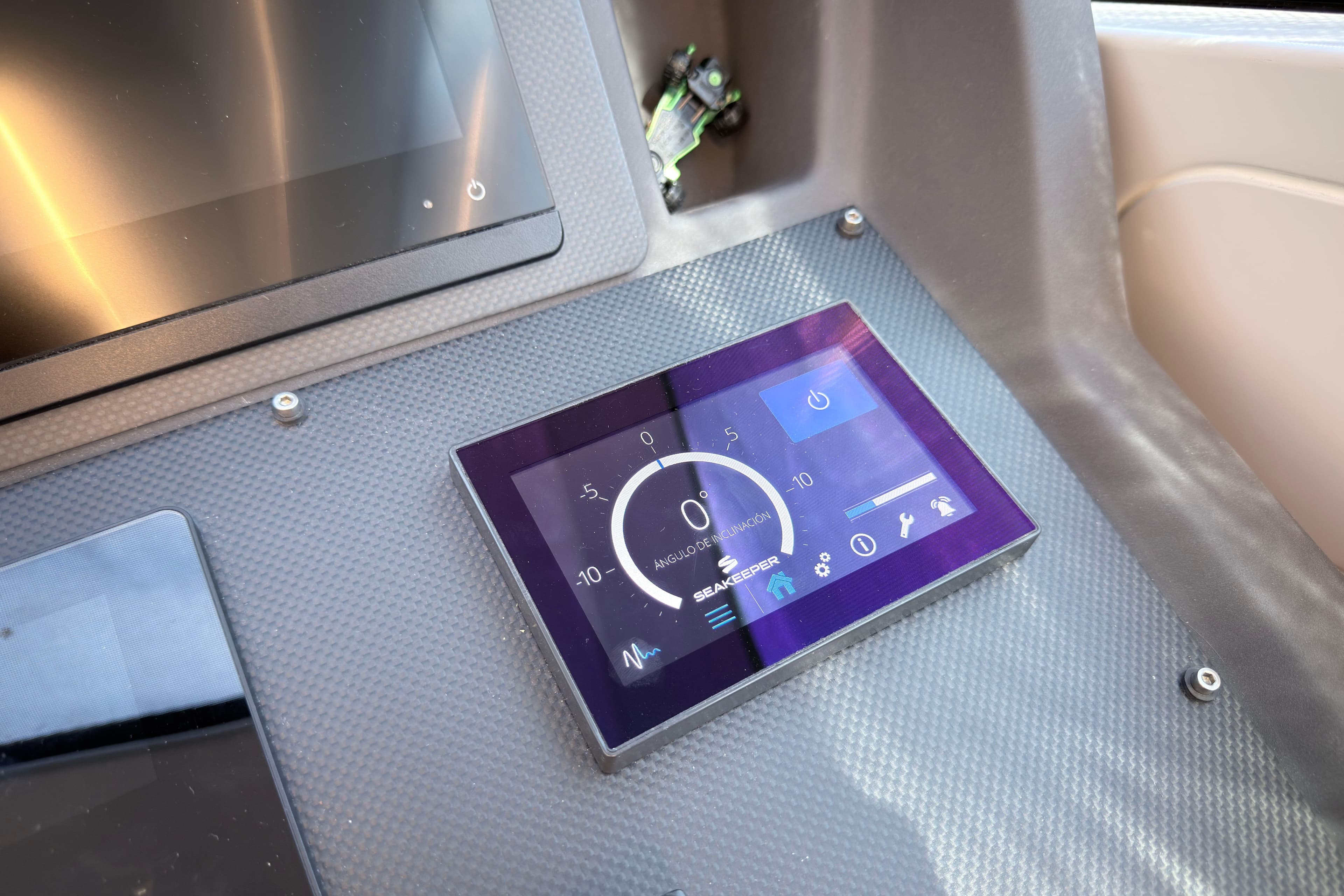 Control panel of 2023 Pershing 5x yacht with Seakeeper stabilization display.