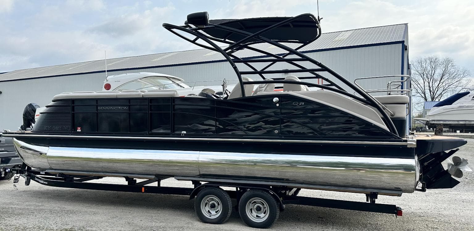 2014 Bennington 2550 QSR pontoon boat on a trailer.