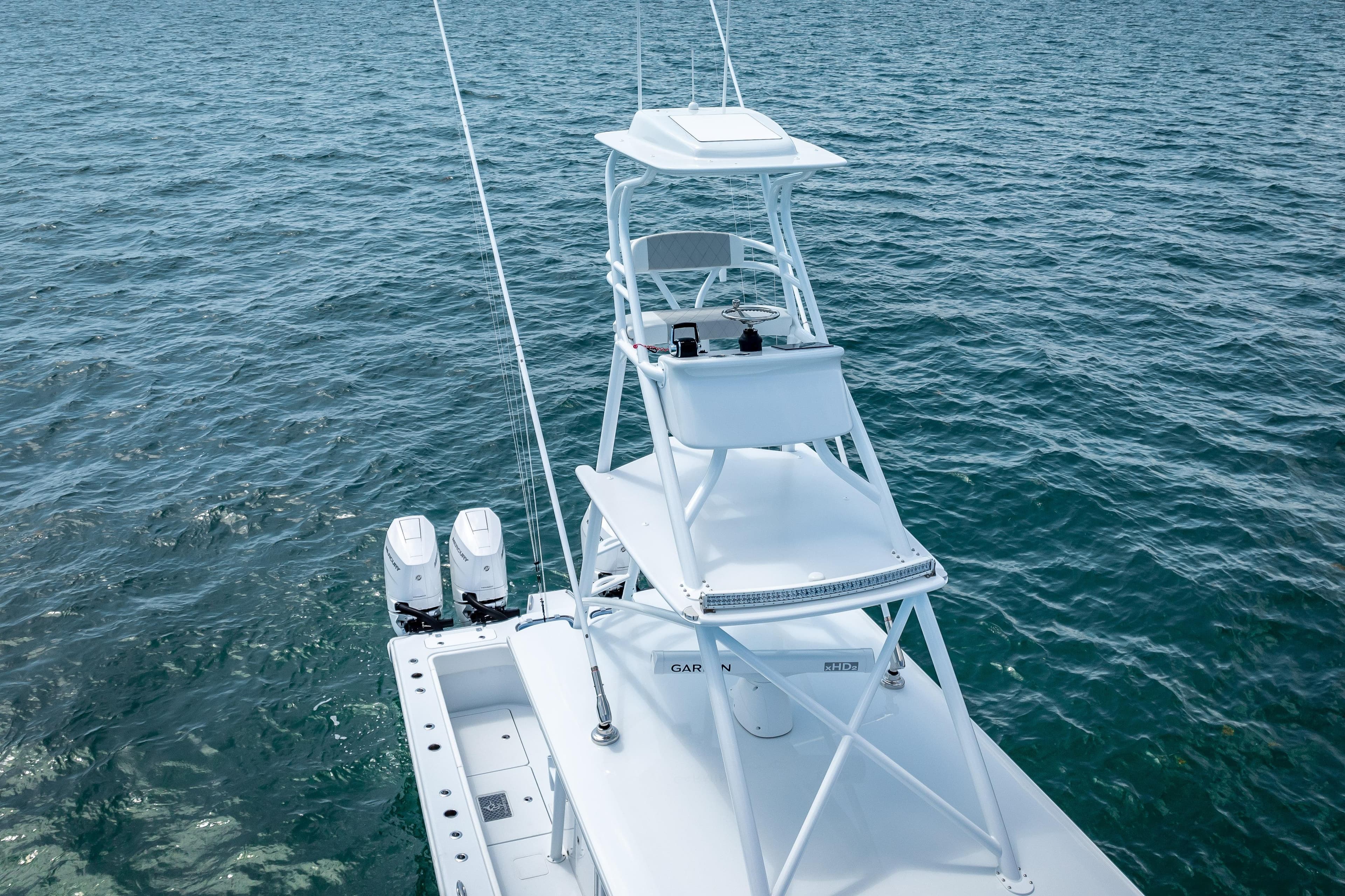 2025 Freeman 43 boat with dual engines on open water.