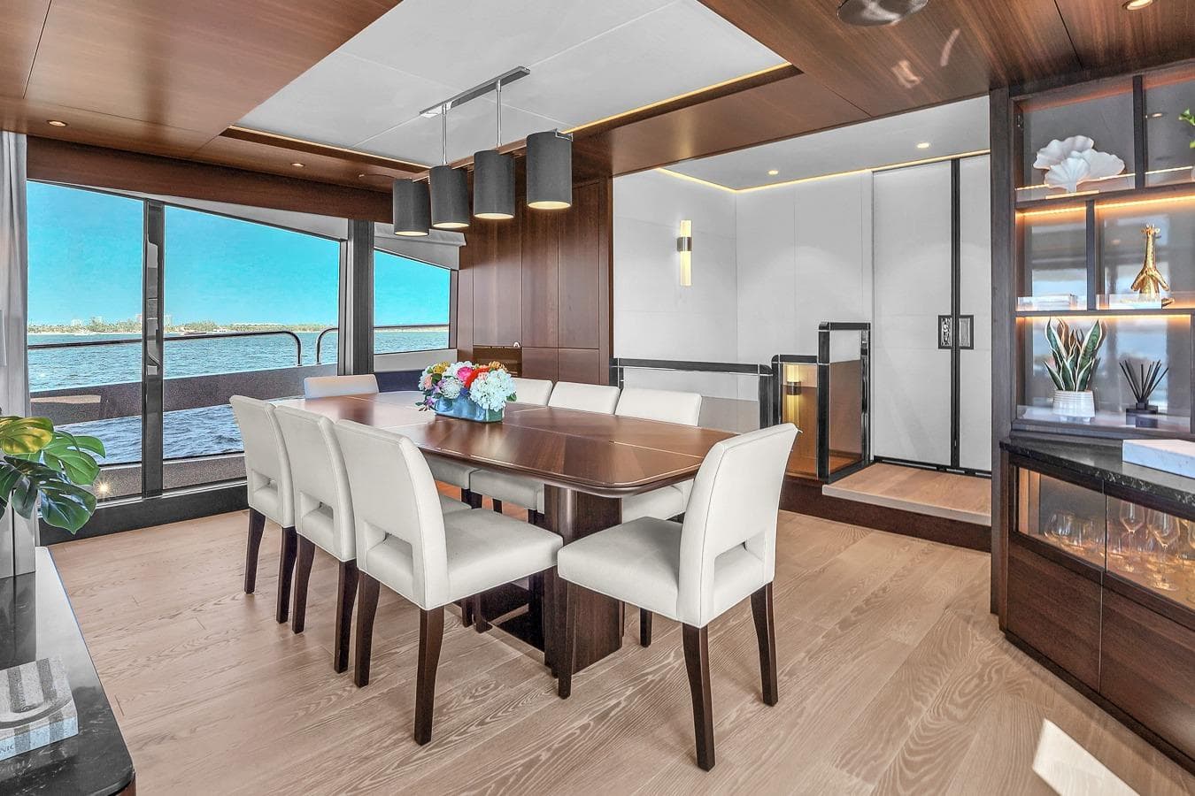 Luxurious dining area on 2024 Sunseeker 88 Yacht with elegant decor and ocean views.