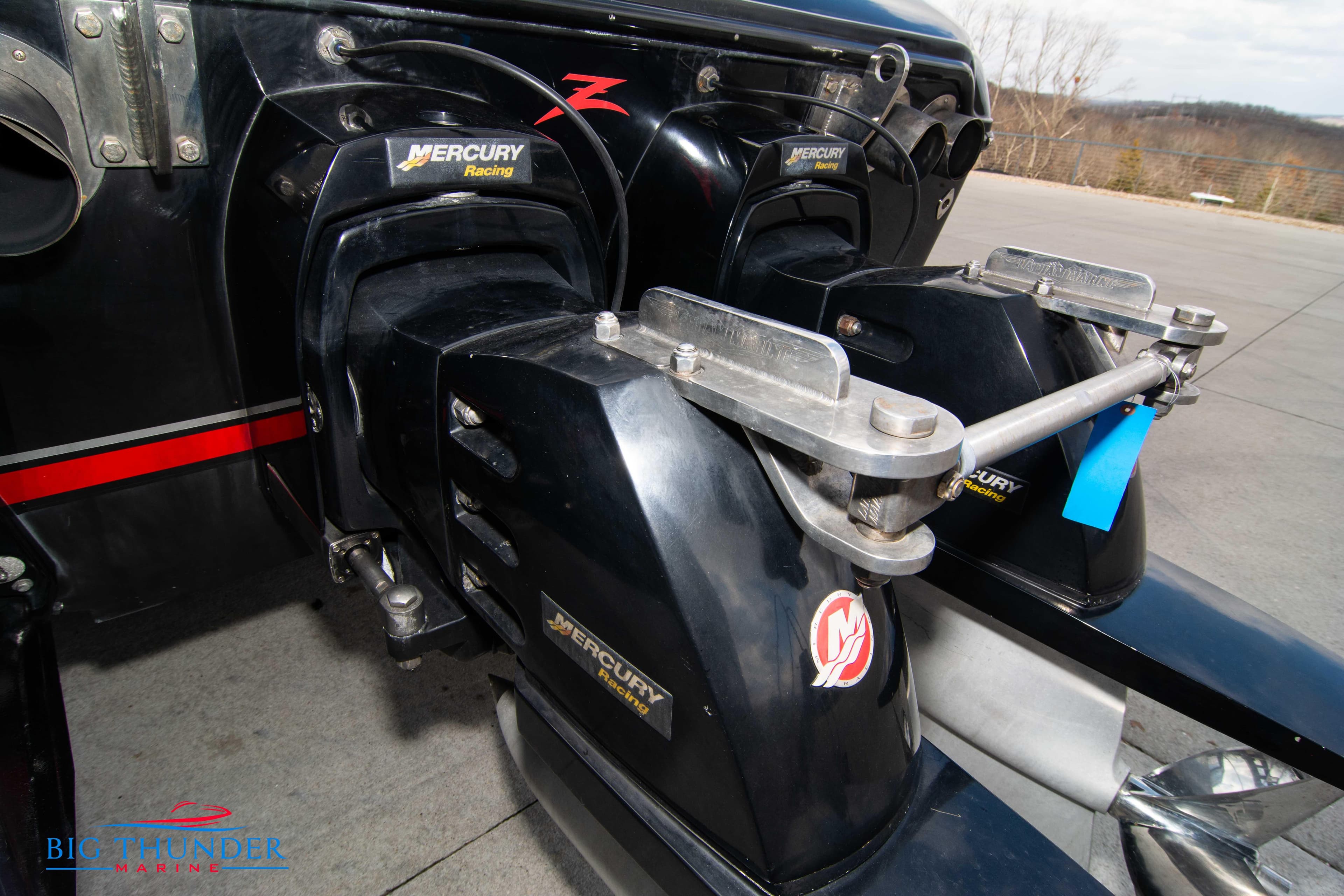 Close-up of 2009 Donzi 38 ZRC boat with twin Mercury Racing engines.