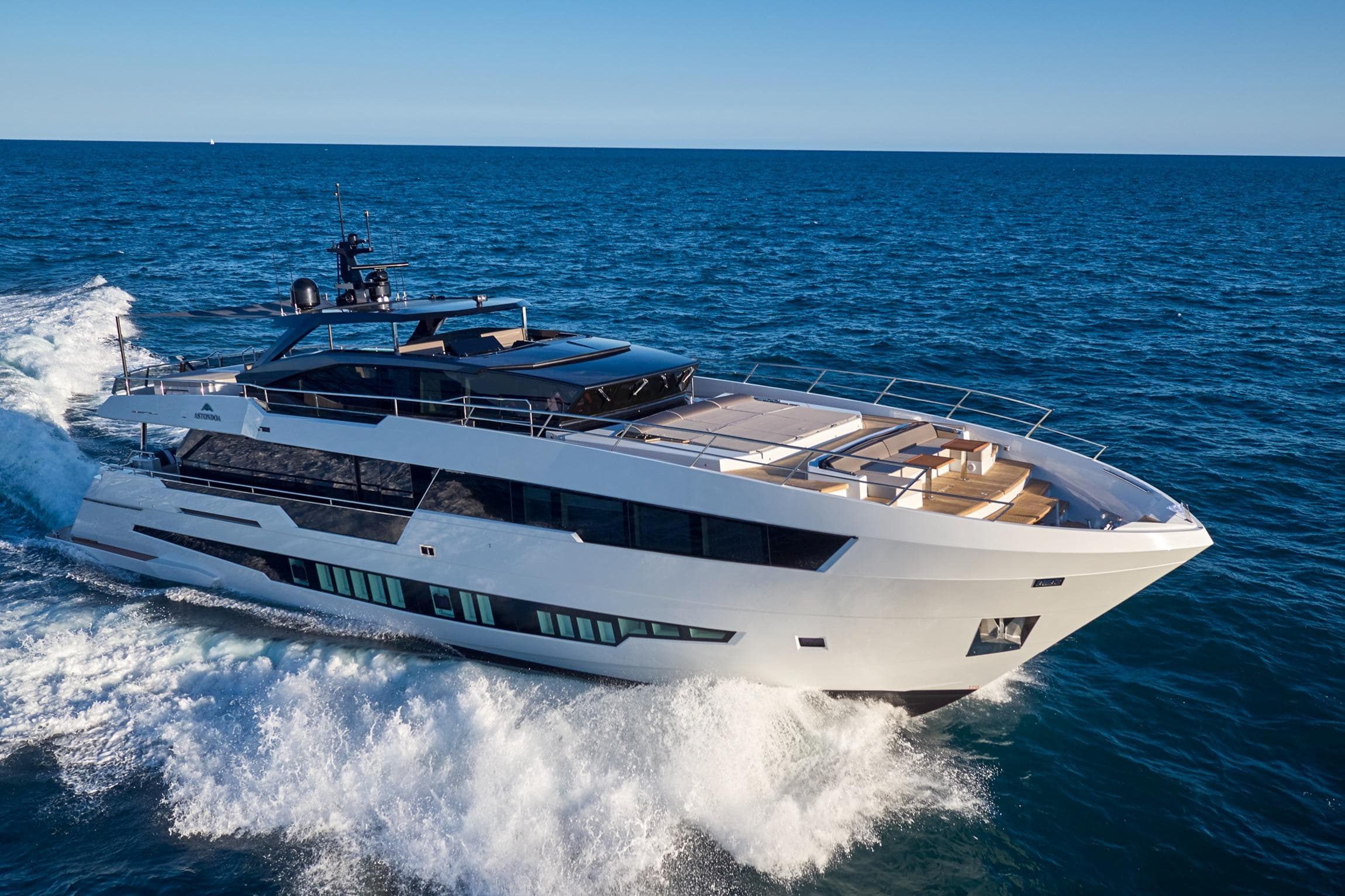 Luxurious 2025 Astondoa Century 100 yacht cruising on open sea.