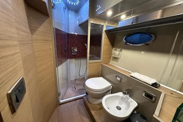 Luxurious bathroom in 2009 Queens Yachts QUEENS 54 with modern fixtures and shower.