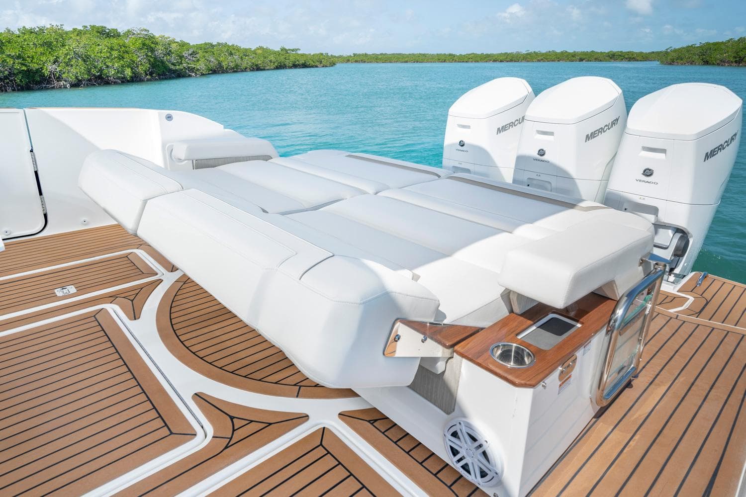 Manufacturer Provided Image: 2025 Tiara Yachts 48 LS with luxurious deck seating and triple Mercury outboard engines.