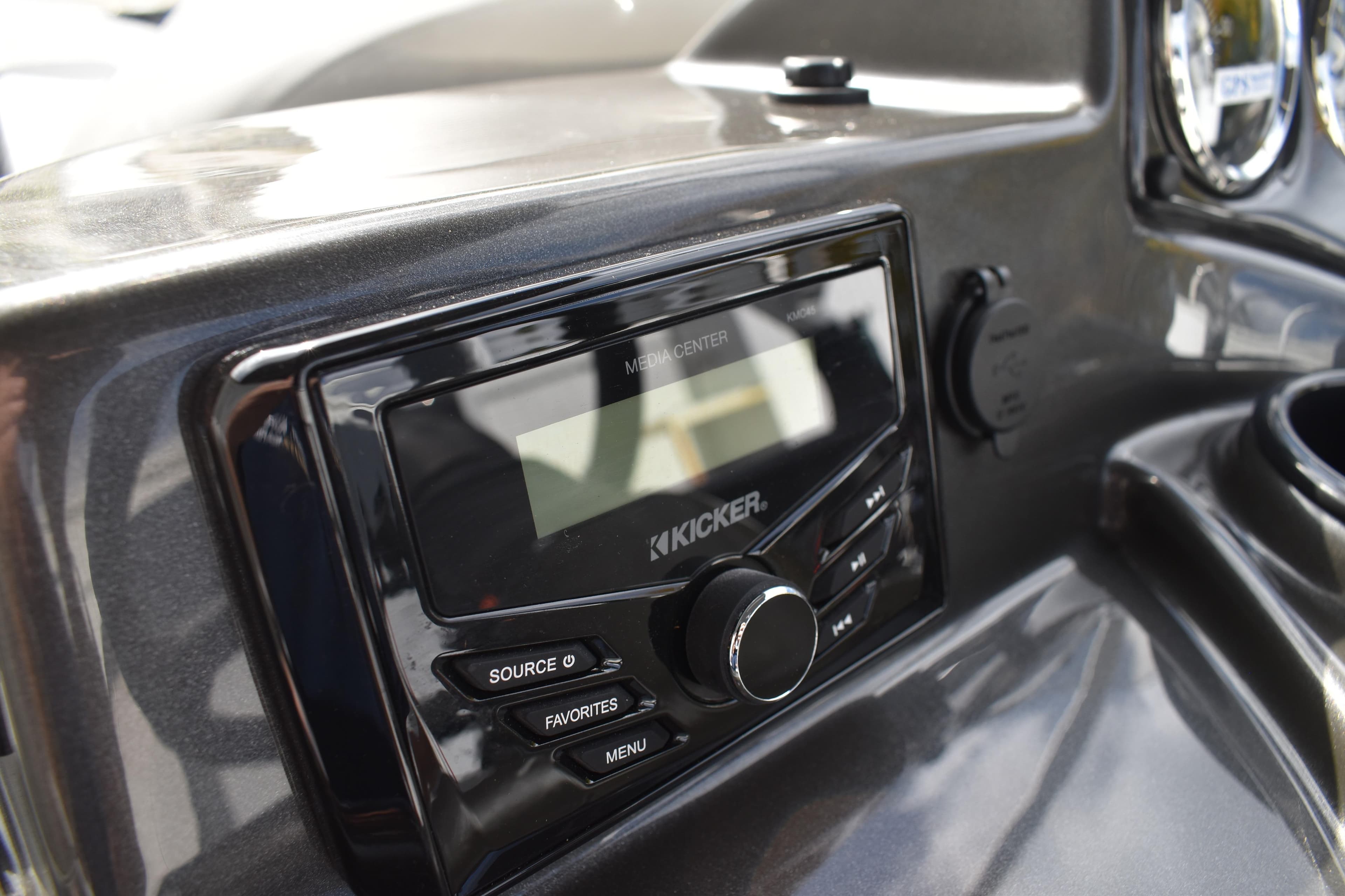 2026 Lowe Sport Deck 224 dashboard with Kicker media center controls.