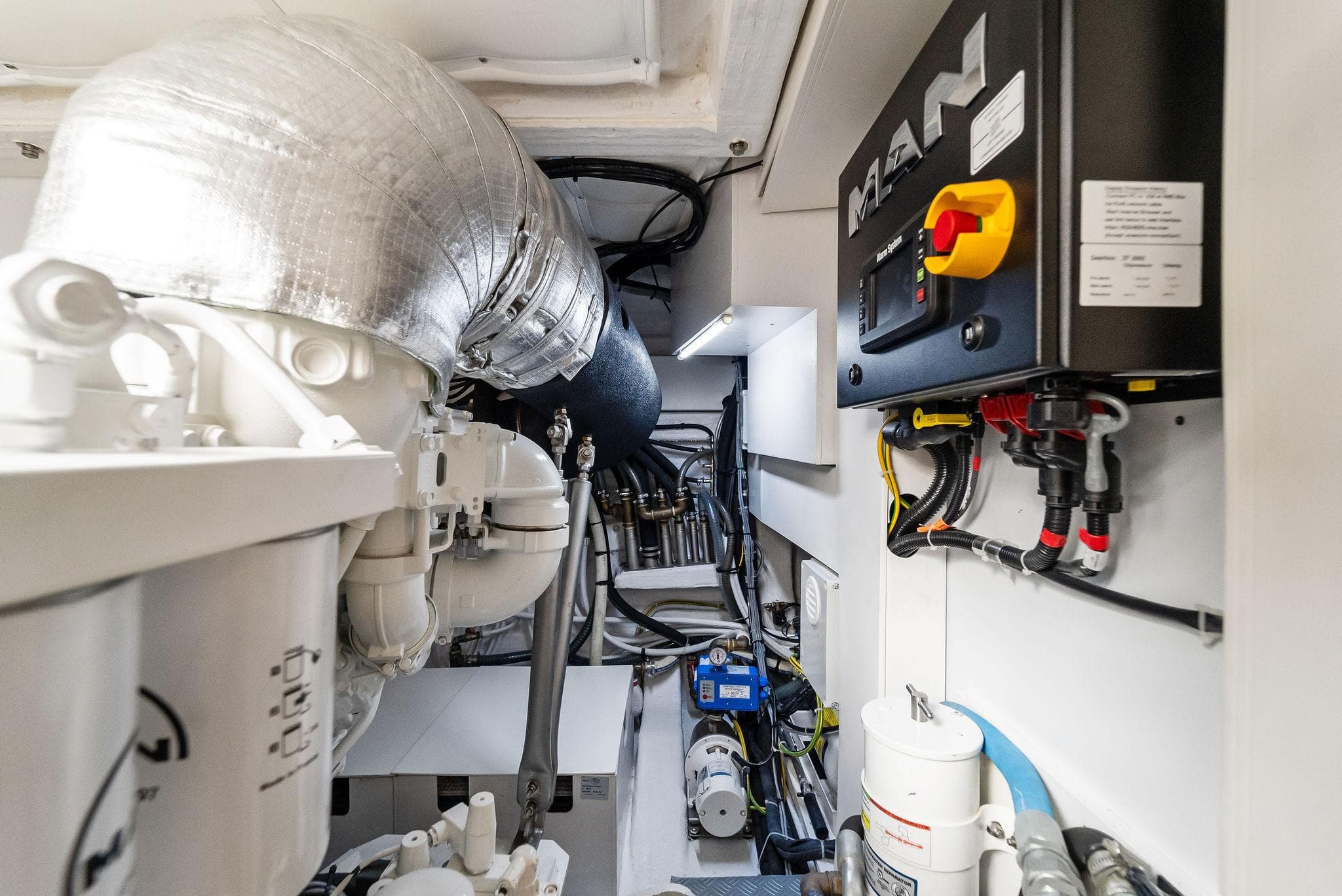 Engine room of 2023 Ferretti Yachts 670, featuring advanced mechanical systems and components.