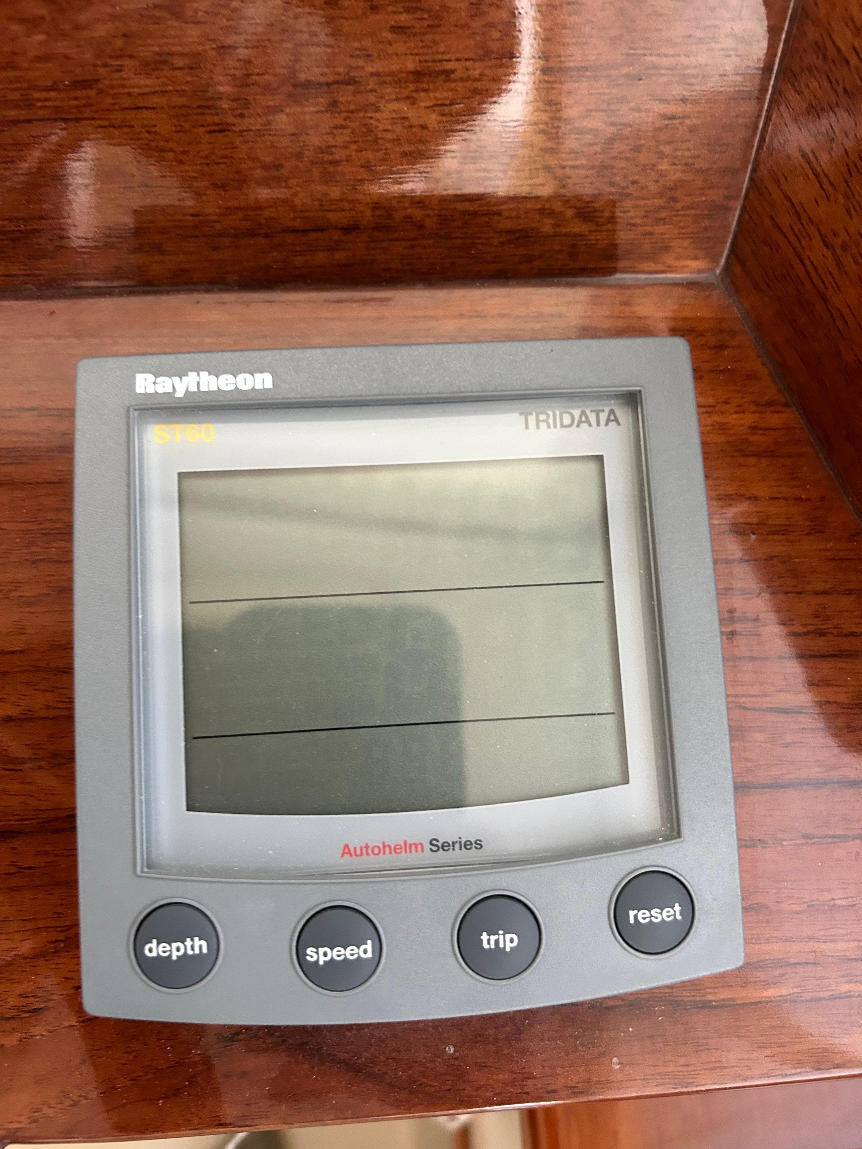 Raytheon Tridata display on 2001 Hinckley Classic 36 Picnic Boat dashboard.