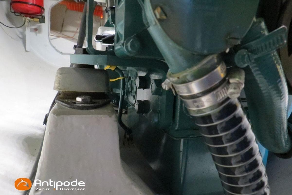 Engine compartment of a 2022 NEEL 43 yacht with visible components and hoses.