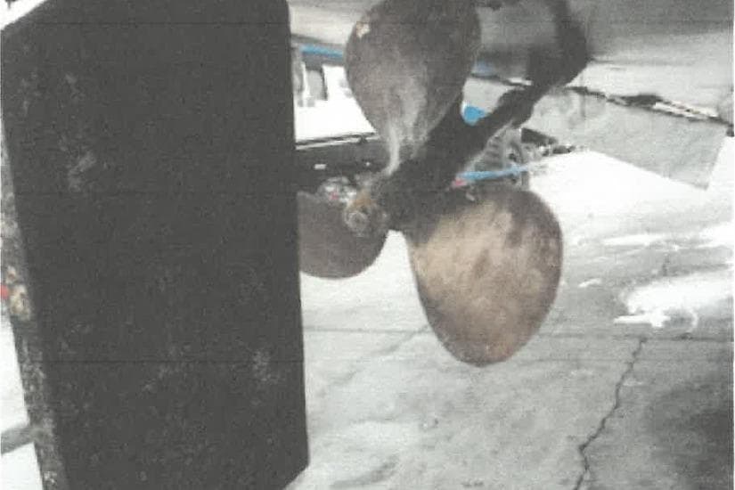 Propeller of 1980 Tollycraft 34 Sedan boat on dry dock.