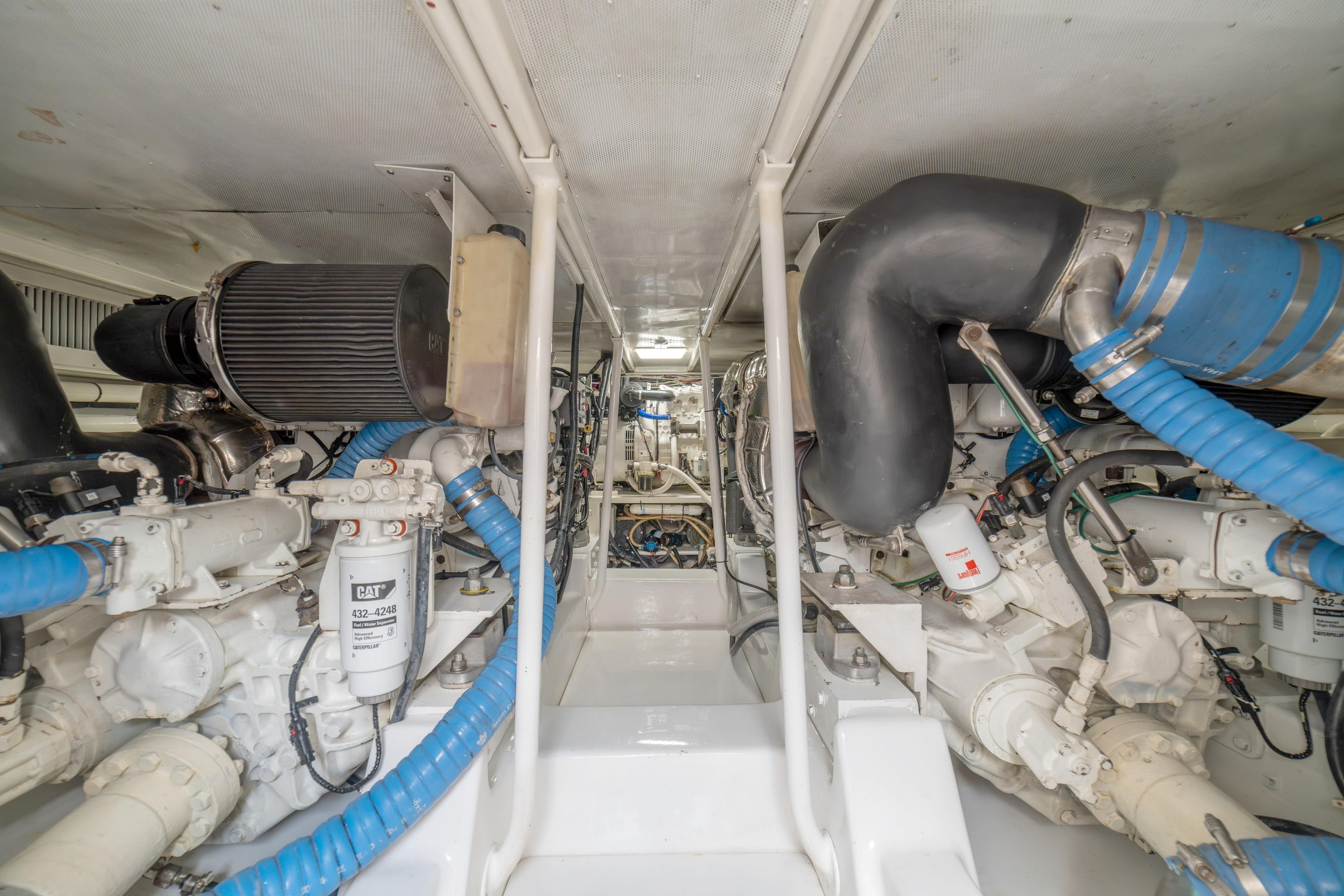 Engine room of 2018 Maverick Yachts Costa Rica 50 Sportfish, showcasing mechanical components.