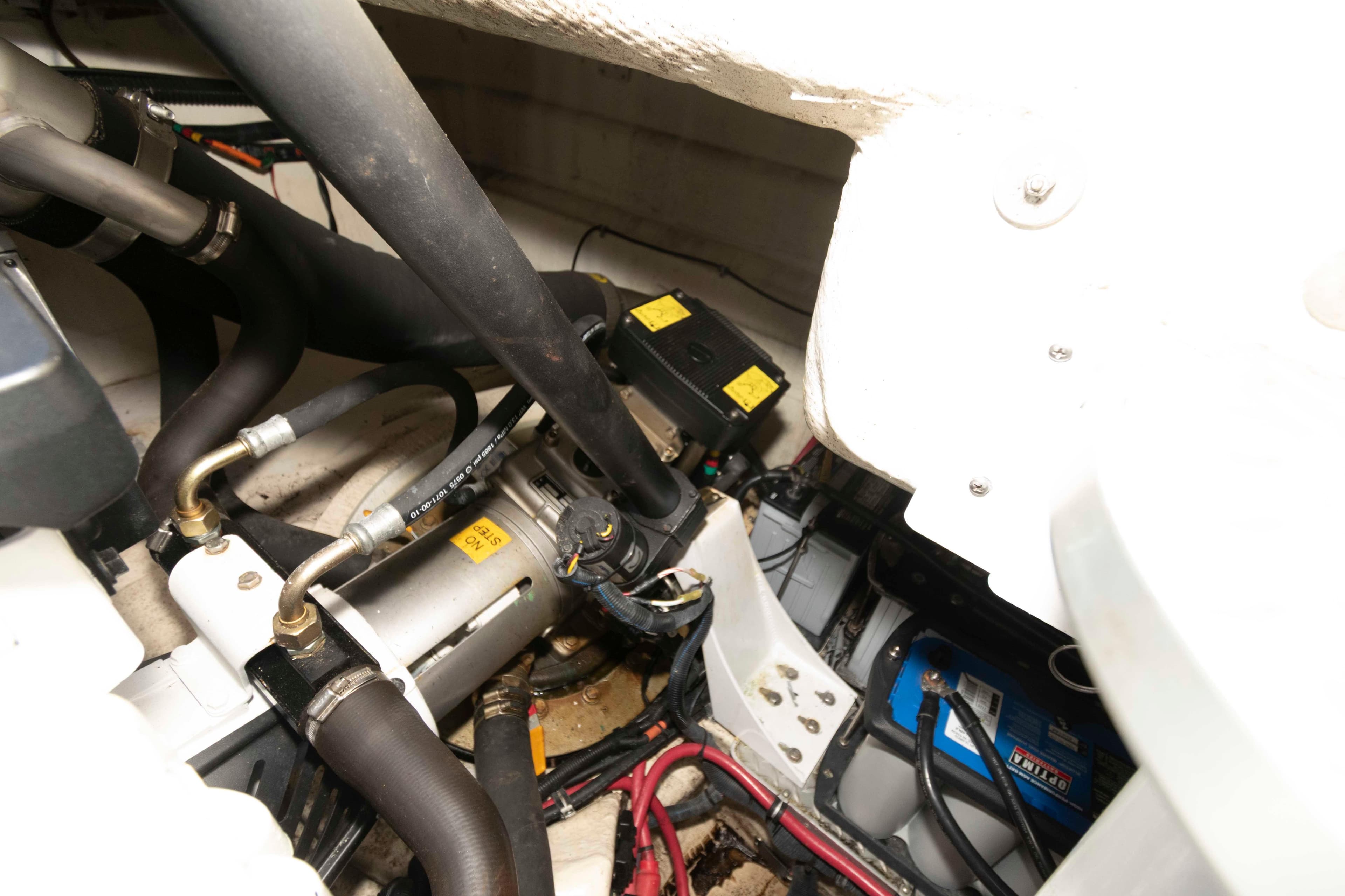 Engine compartment of a 2011 Formula 37 Performance Cruiser, showcasing mechanical components.