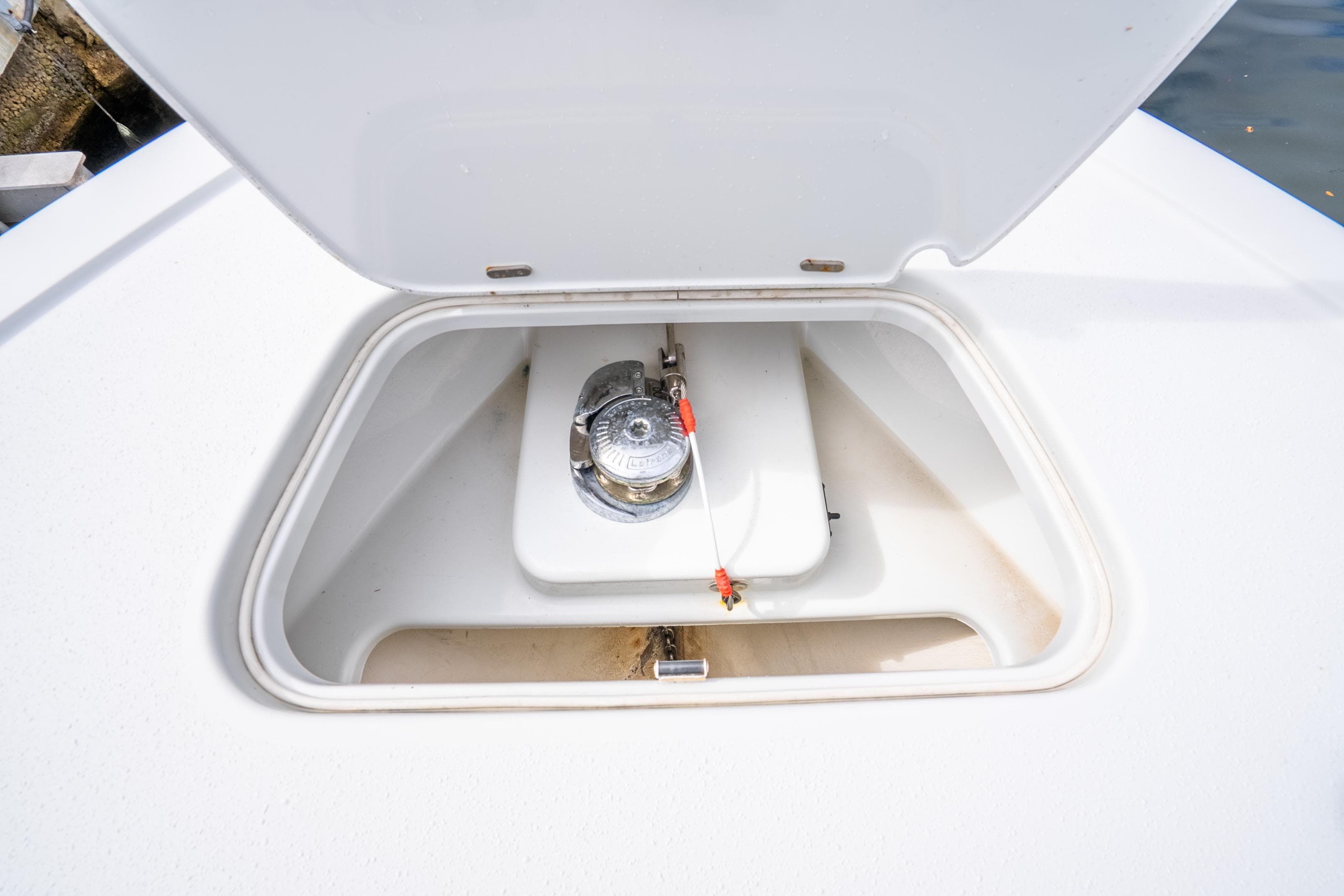 2016 Yellowfin 36 Offshore boat anchor compartment with open hatch.