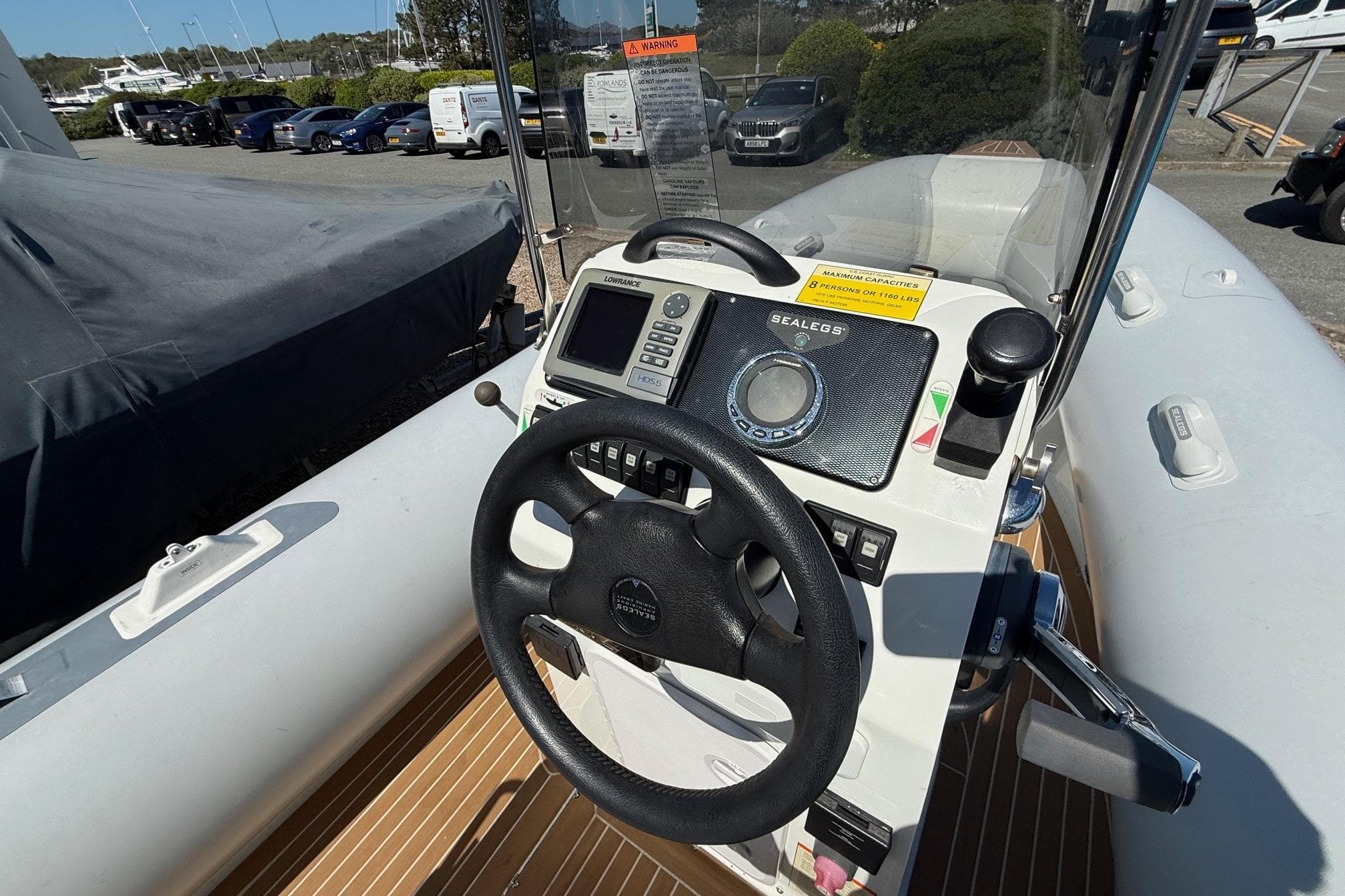 Sealegs 7.1m RIB 2010 model dashboard with steering wheel and control panel.