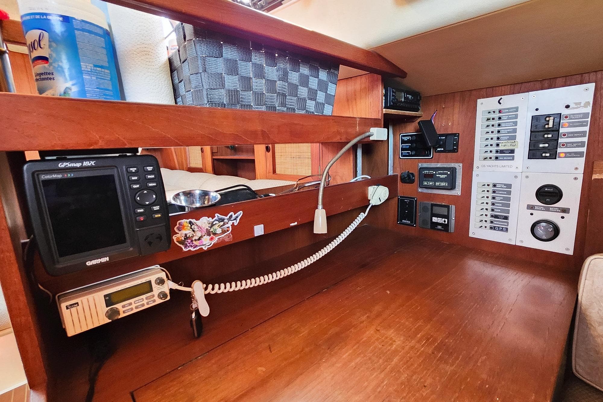 Navigation and control panel inside a 1982 Canadian Sailcraft CS 36 sailboat cabin.