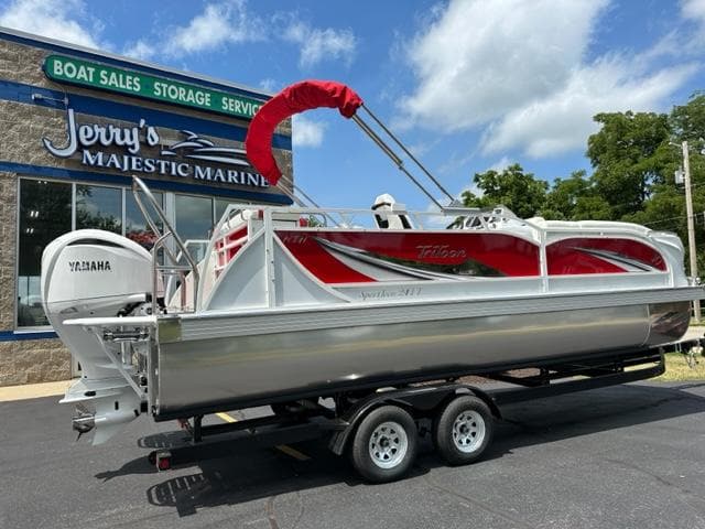 2023 JC SportToon 24 TT pontoon boat at Jerry's Majestic Marine dealership.