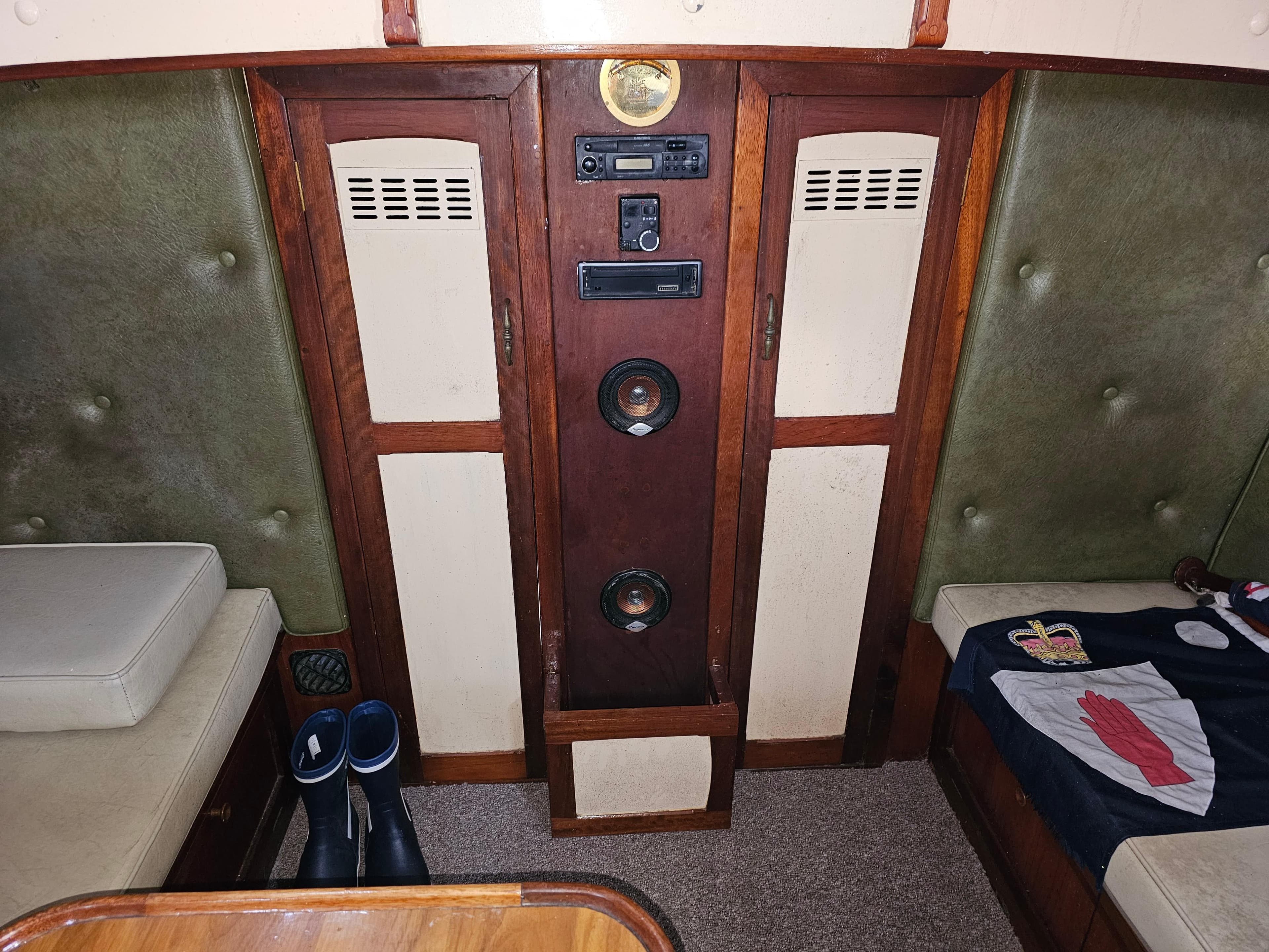 Interior of 1978 Custom John Bain TSMY with vintage wood paneling and seating.