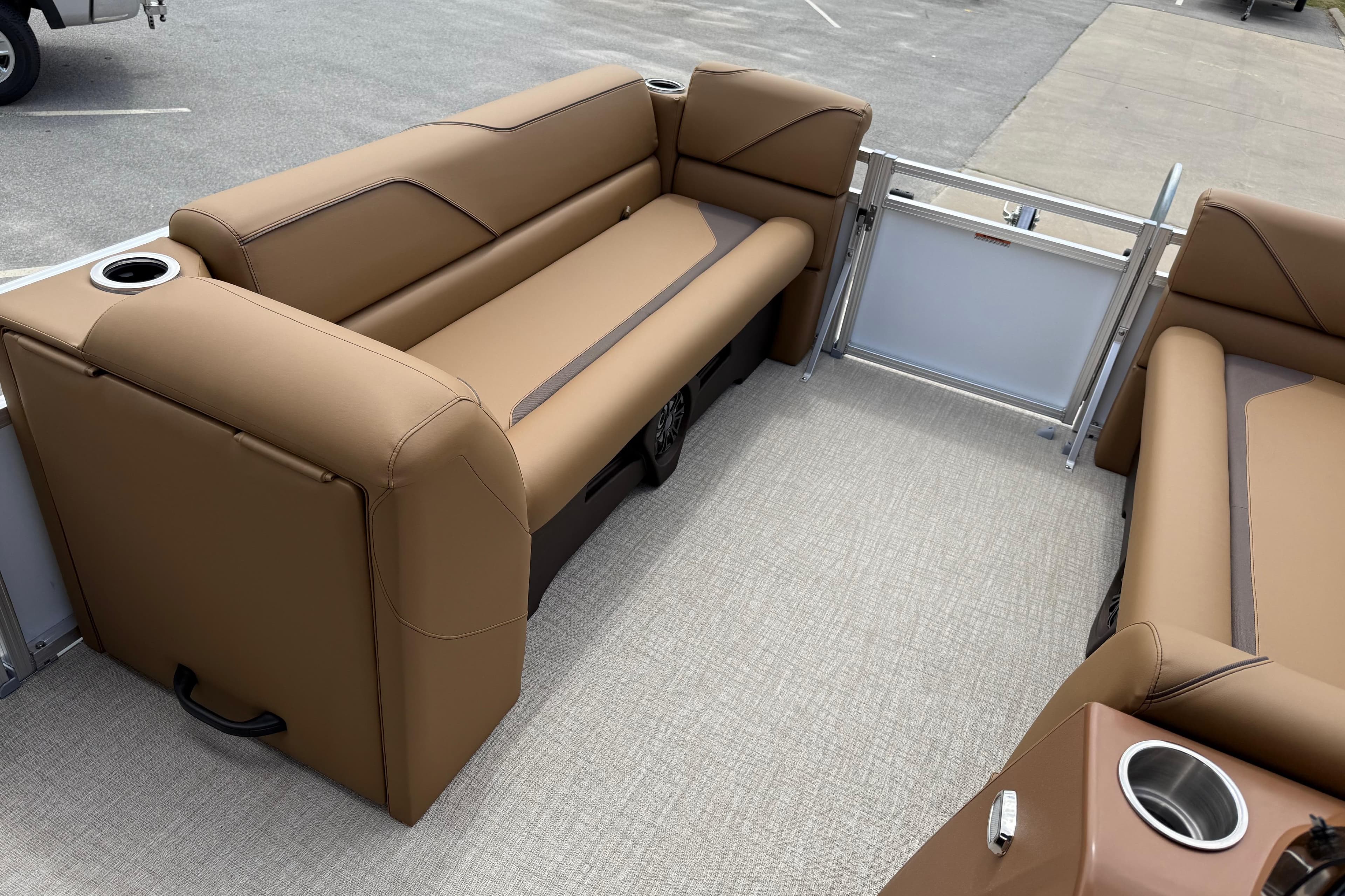 2026 Avalon VENTURE QUAD LOUNGE interior with tan seating and cup holders.