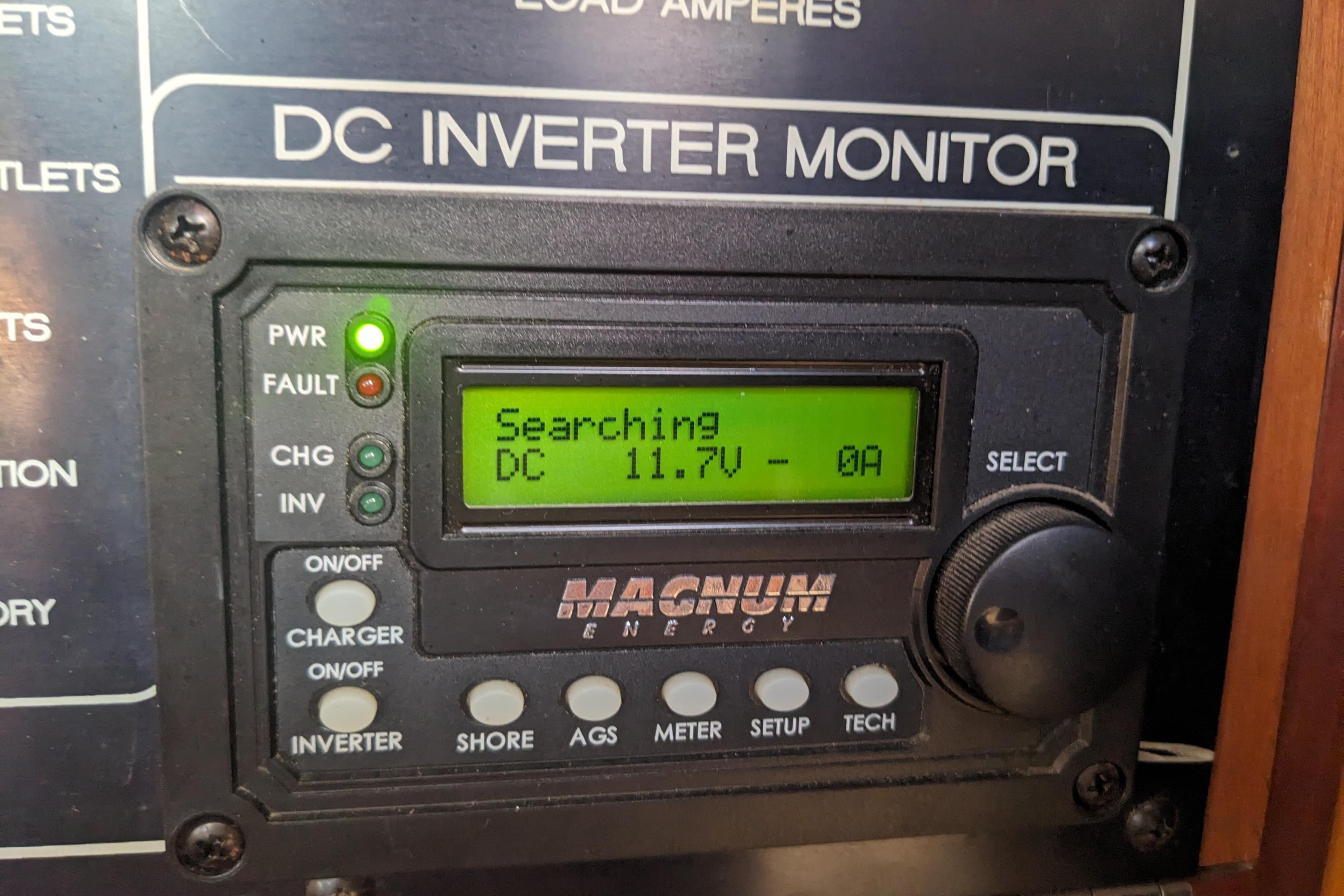 DC inverter monitor on Bruce Bingham Custom 47, displaying 11.7V, 0A.