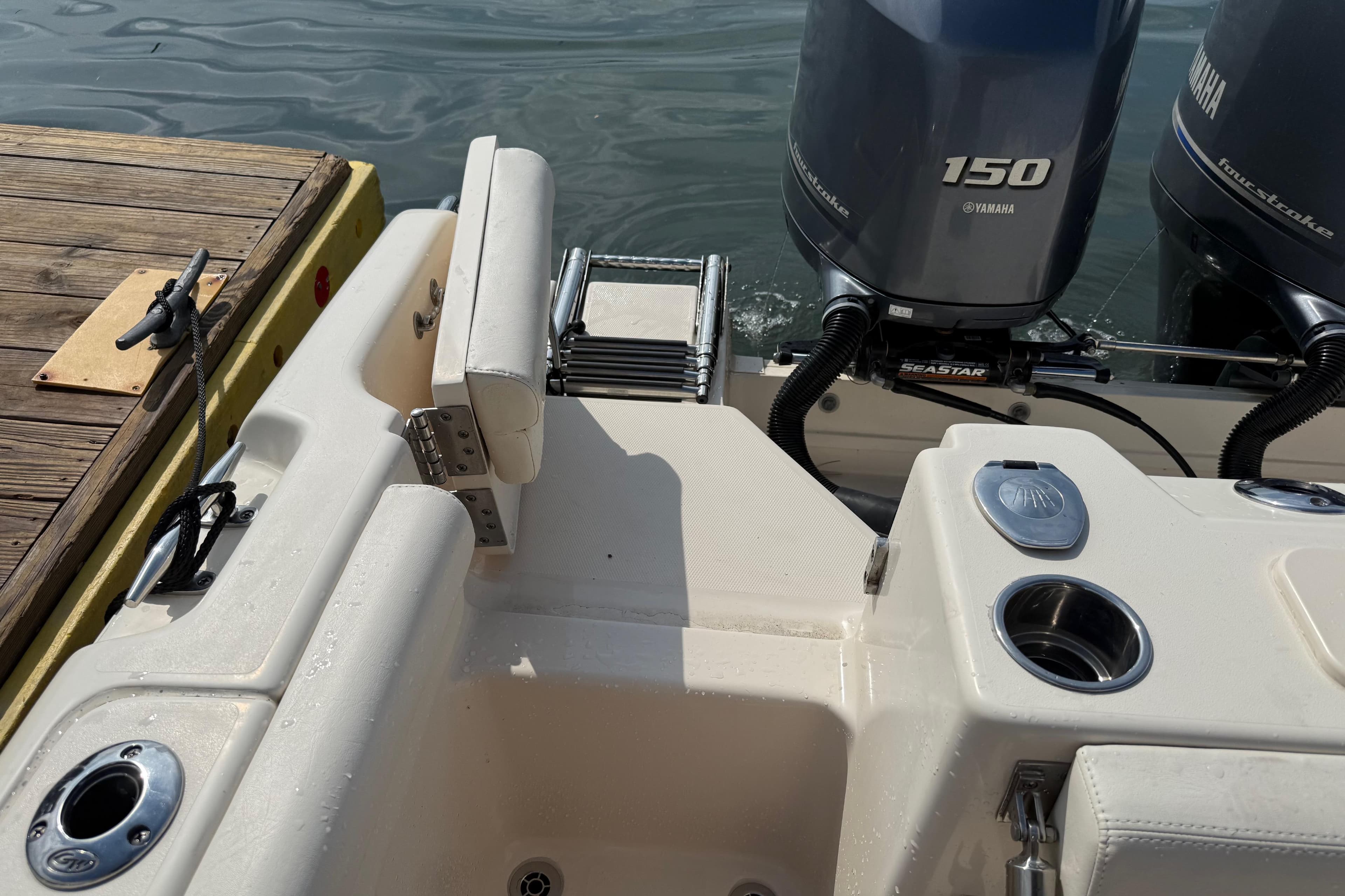 2019 Grady-White Freedom 255 boat with Yamaha 150 engines at dockside.