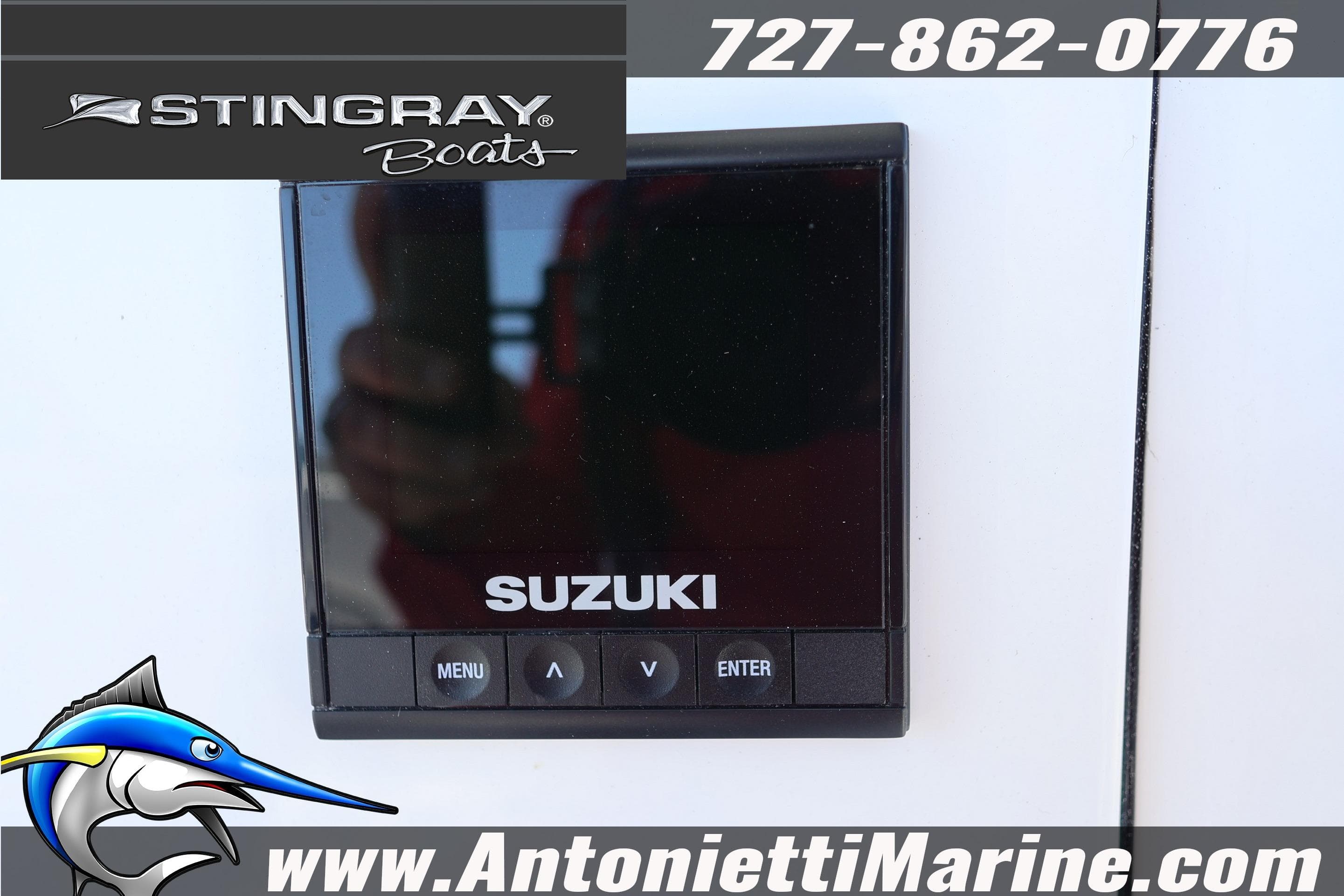 2026 Stingray 216 CC boat featuring Suzuki control panel, Antonietti Marine branding.