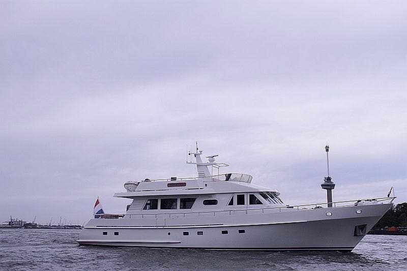 Moonen 72 yacht from 1987 on calm waters under a cloudy sky.