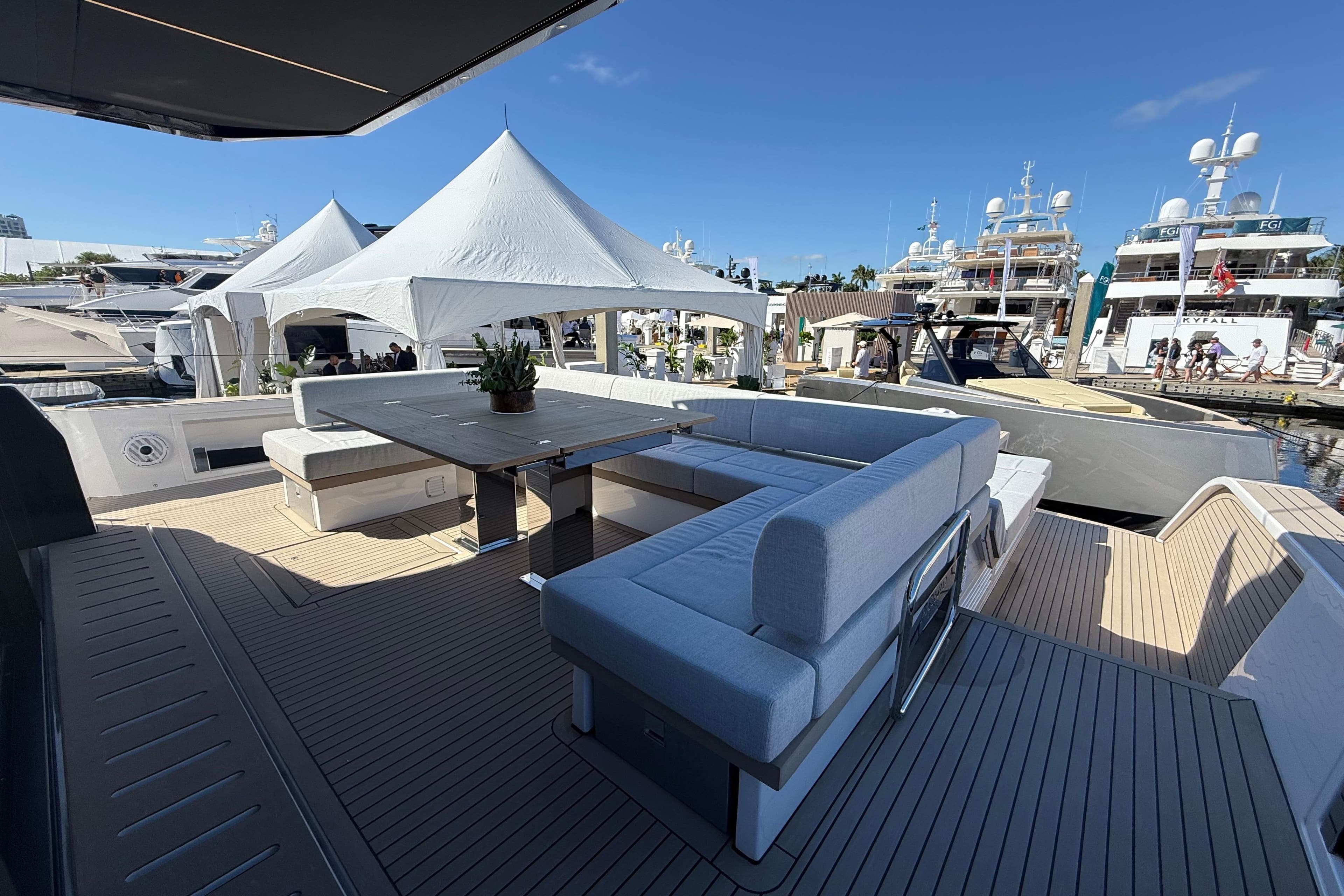 Luxurious 2026 Pardo Yachts GT75 deck with elegant seating and table setup.