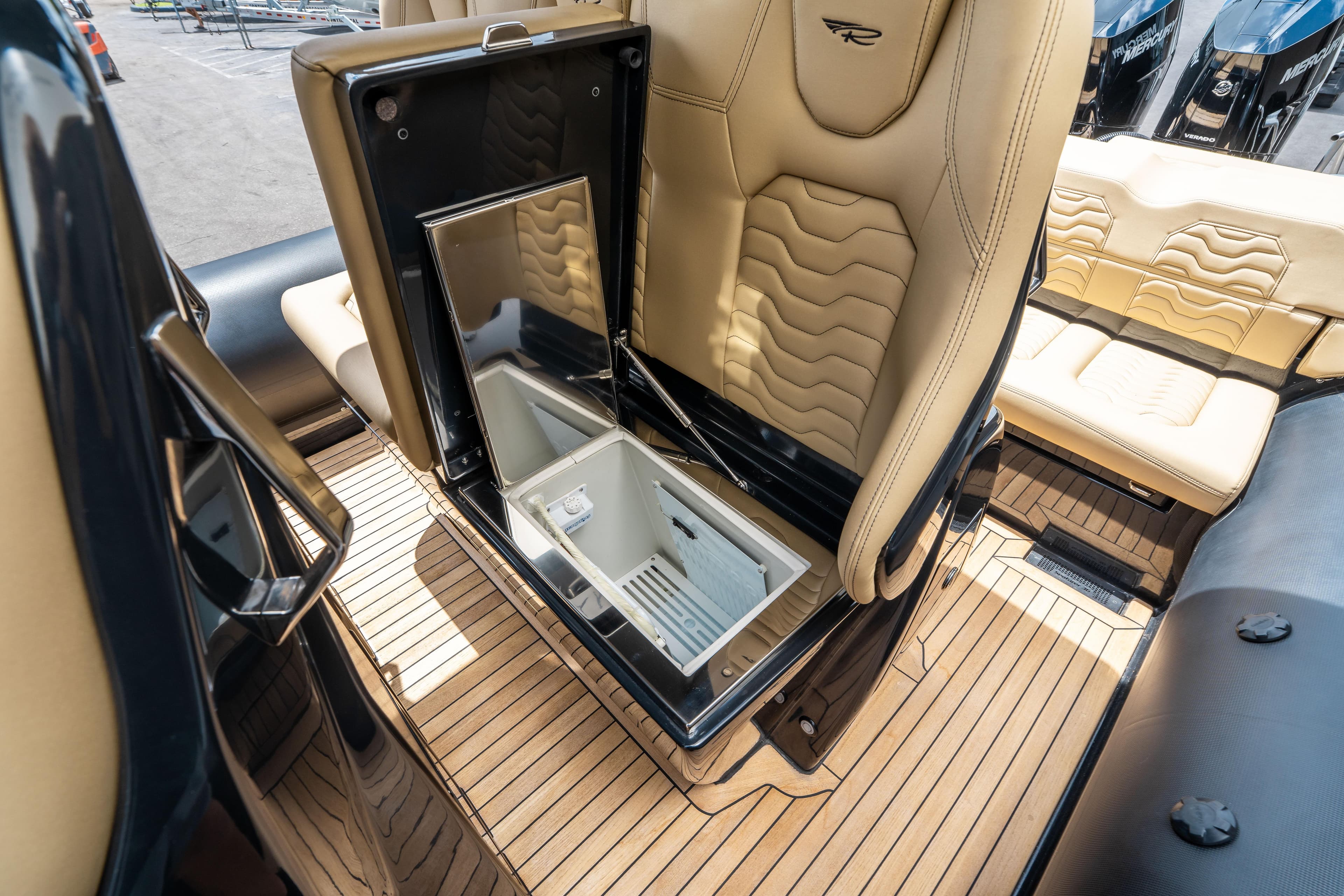 2023 Ribco Seafarer 36 X interior with luxurious seating and built-in storage compartment.