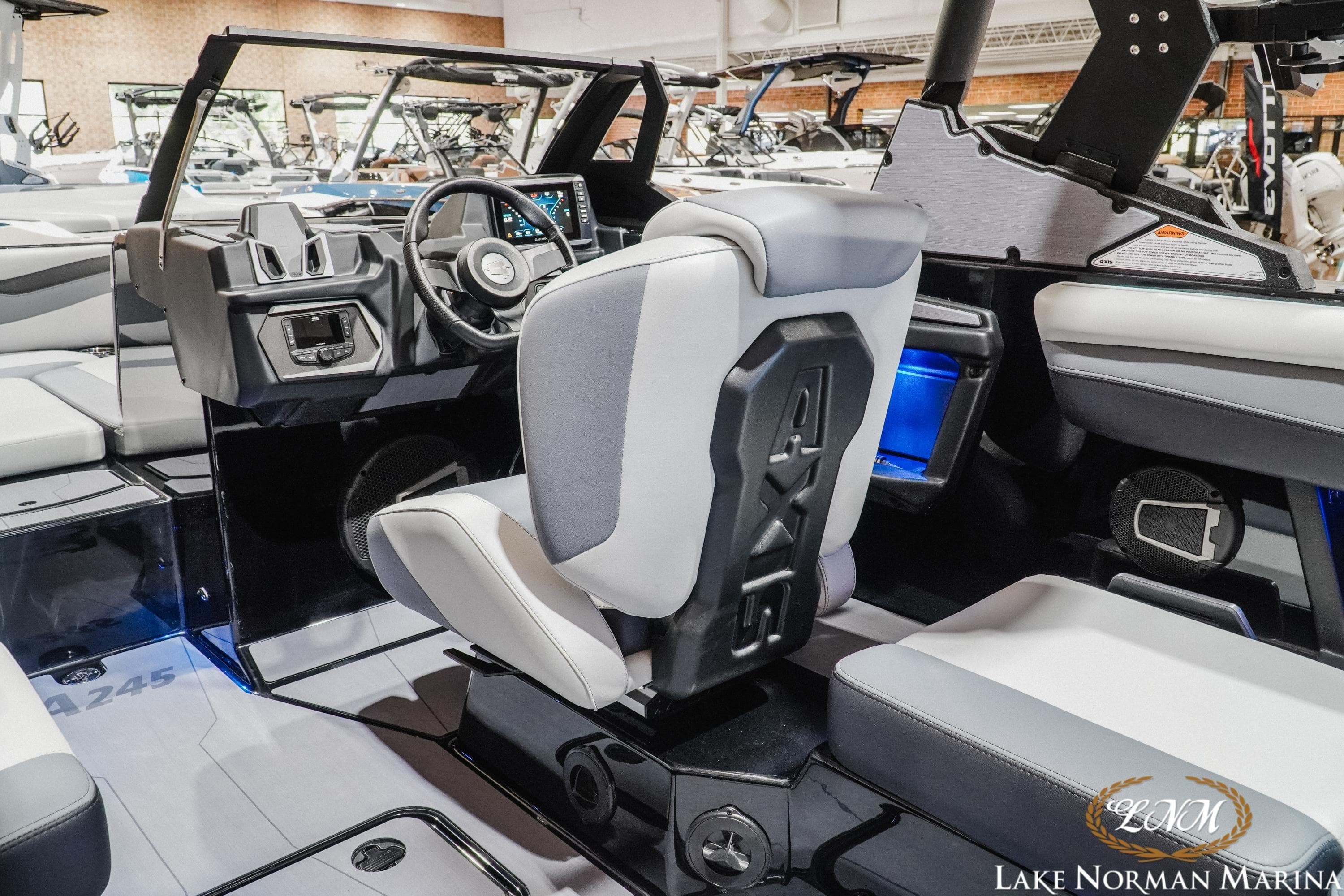 2026 Axis A245 boat interior with modern dashboard and seating at Lake Norman Marina.