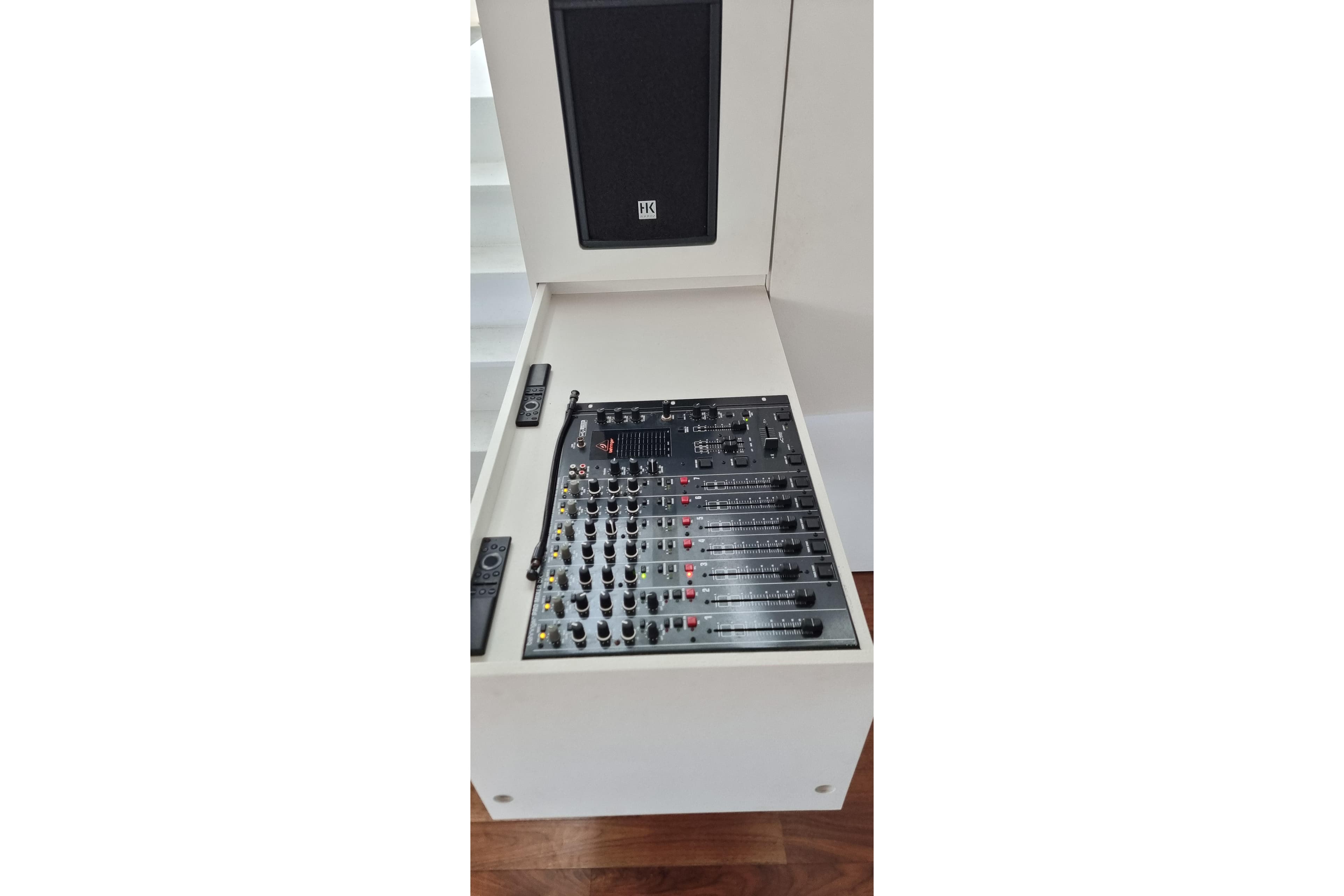 Audio control panel on a 2023 Custom 22m Catamaran, featuring a sleek design and advanced controls.