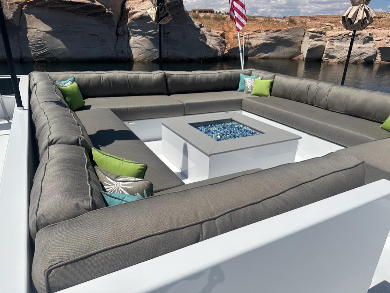 Luxurious outdoor seating on Adonia Meticulous Share #7, featuring a central fire pit.