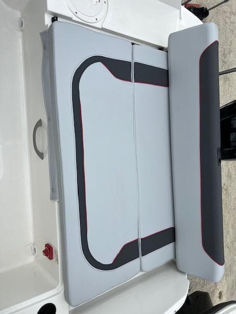 2024 Bayliner Element M19 boat seating area with gray and black upholstery.