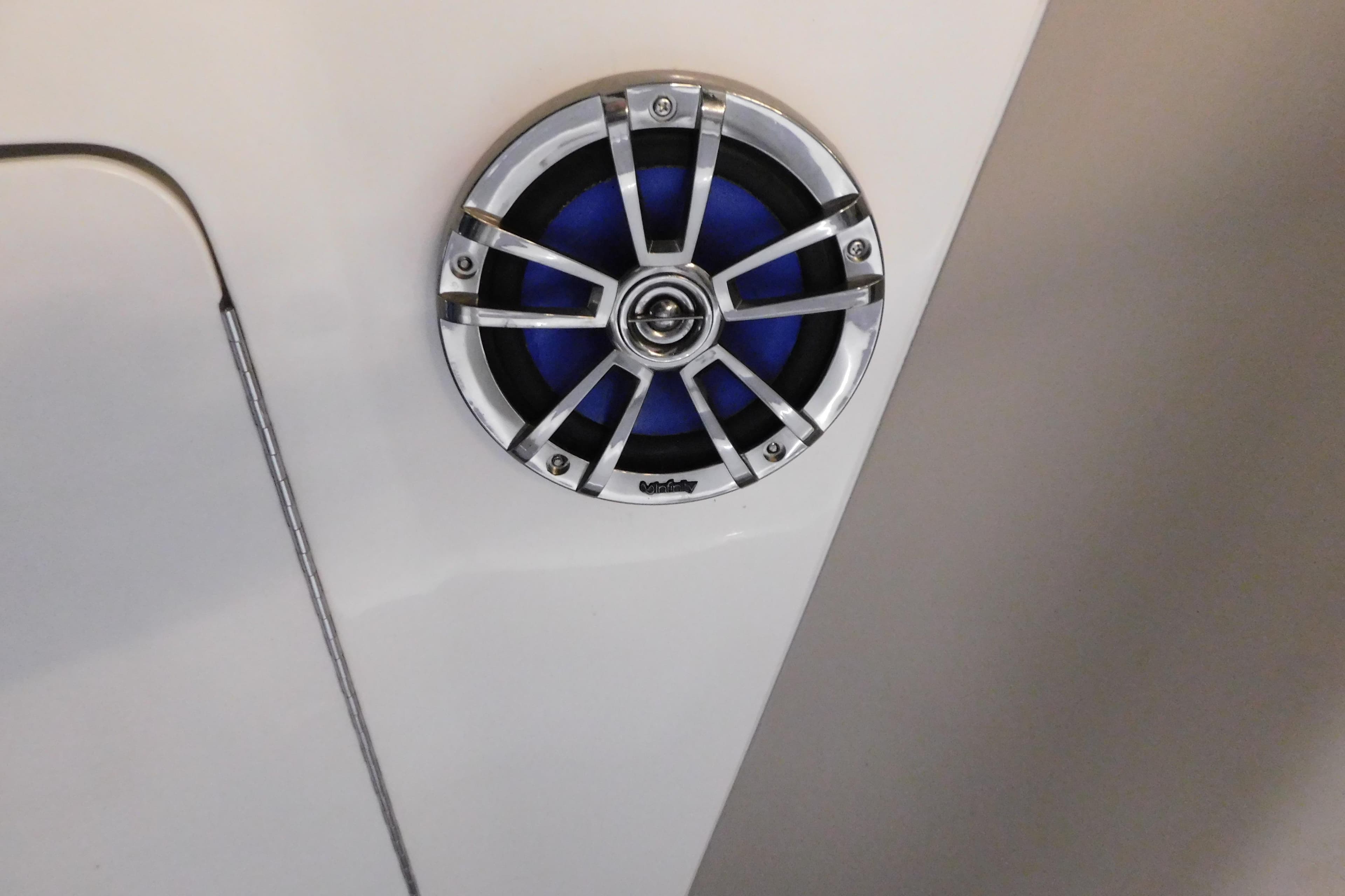 Marine speaker on 2002 Sea Ray 340 Sundancer boat, featuring a sleek chrome design.