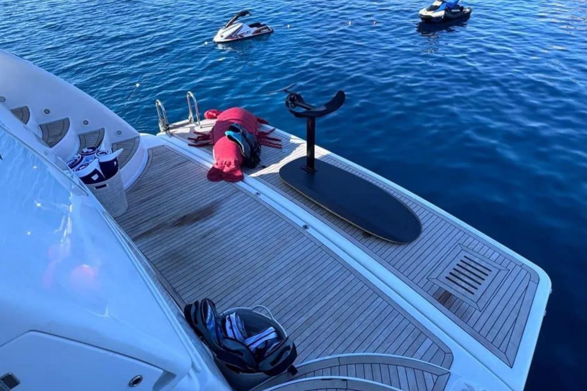 Luxury yacht Sanlorenzo SL88 deck with water sports equipment, 2000 model.
