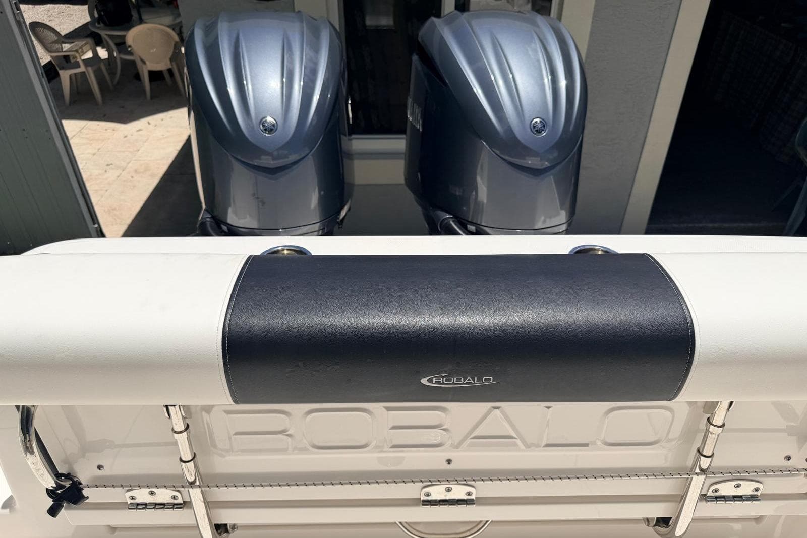 2022 Robalo R302 Center Console boat with dual outboard engines.