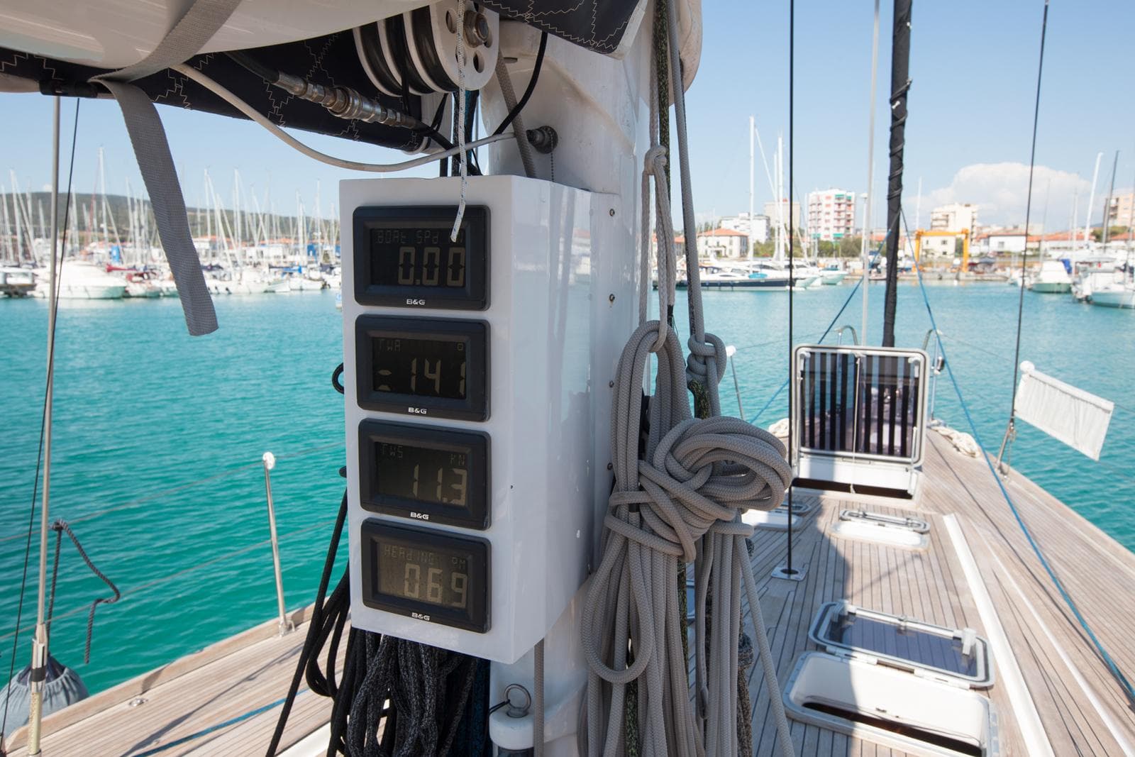 Sailing yacht Nautor Swan 60, 1998 model, with digital instruments on deck in a marina.