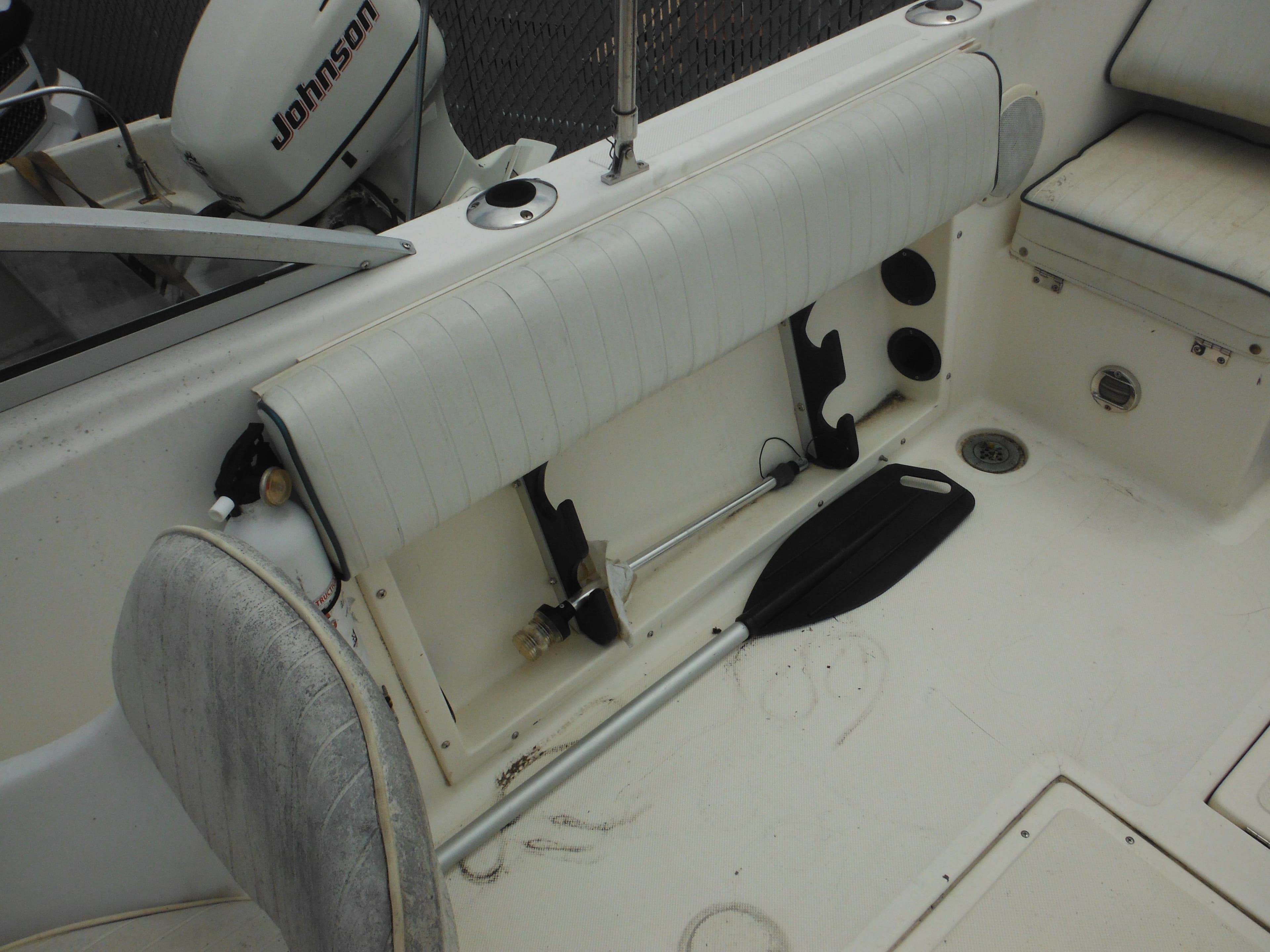 1996 Hydra-Sports 2000 DC boat interior with Johnson outboard motor and seating.