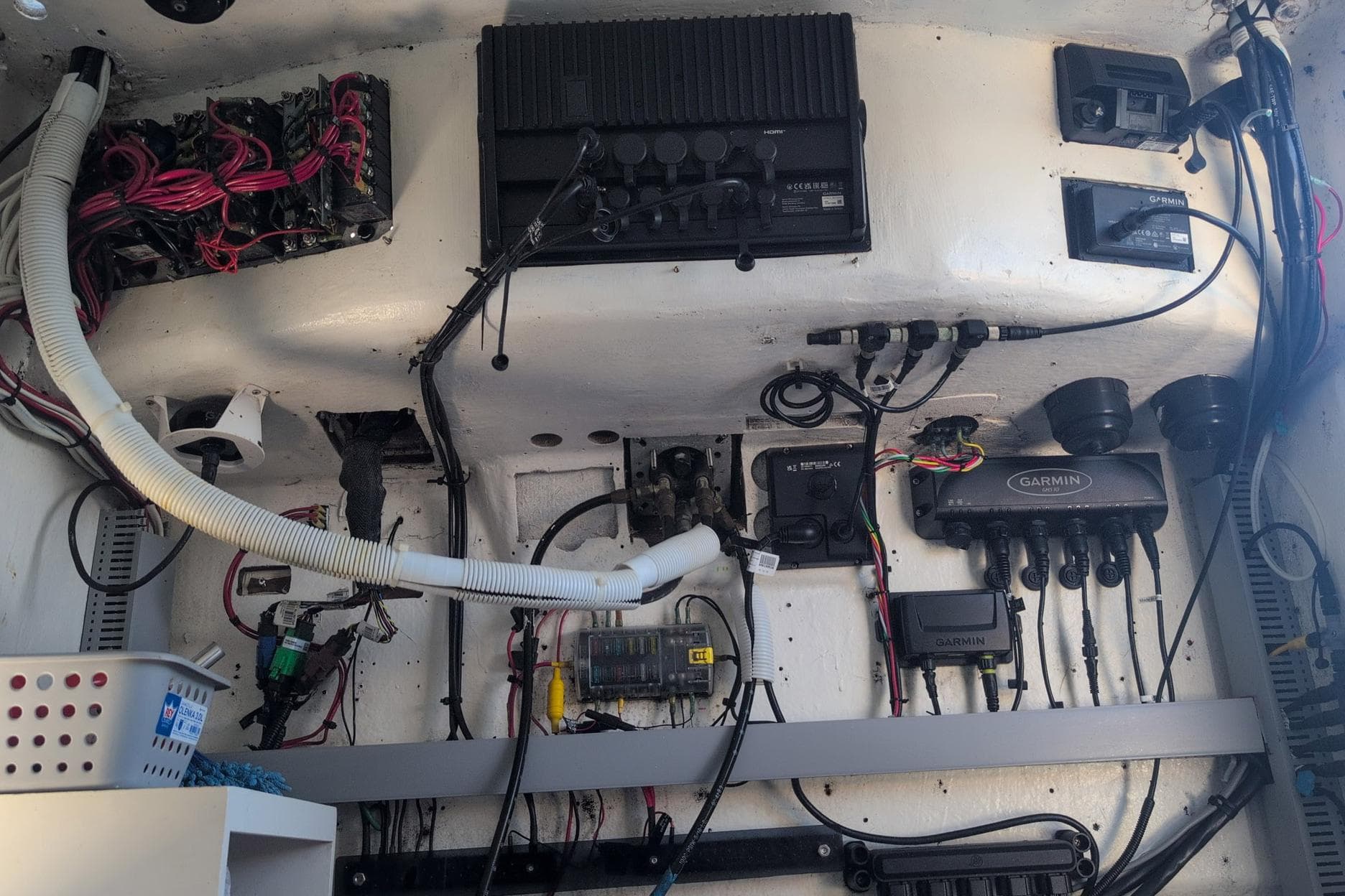 Electrical system and wiring inside a 1995 Ocean Master 34 boat.