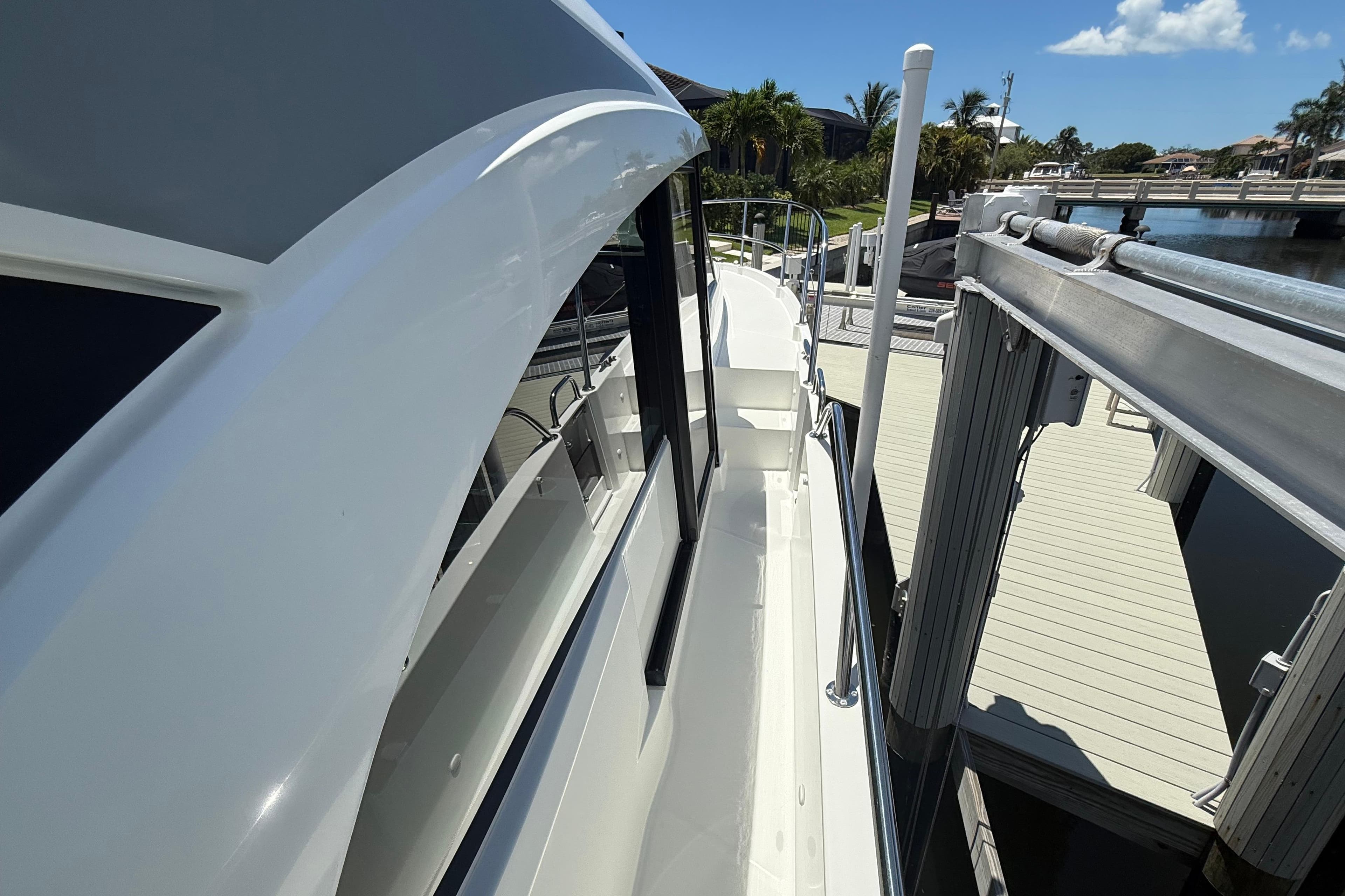 2024 Beneteau Antares 11 yacht docked, showcasing sleek design and modern features.