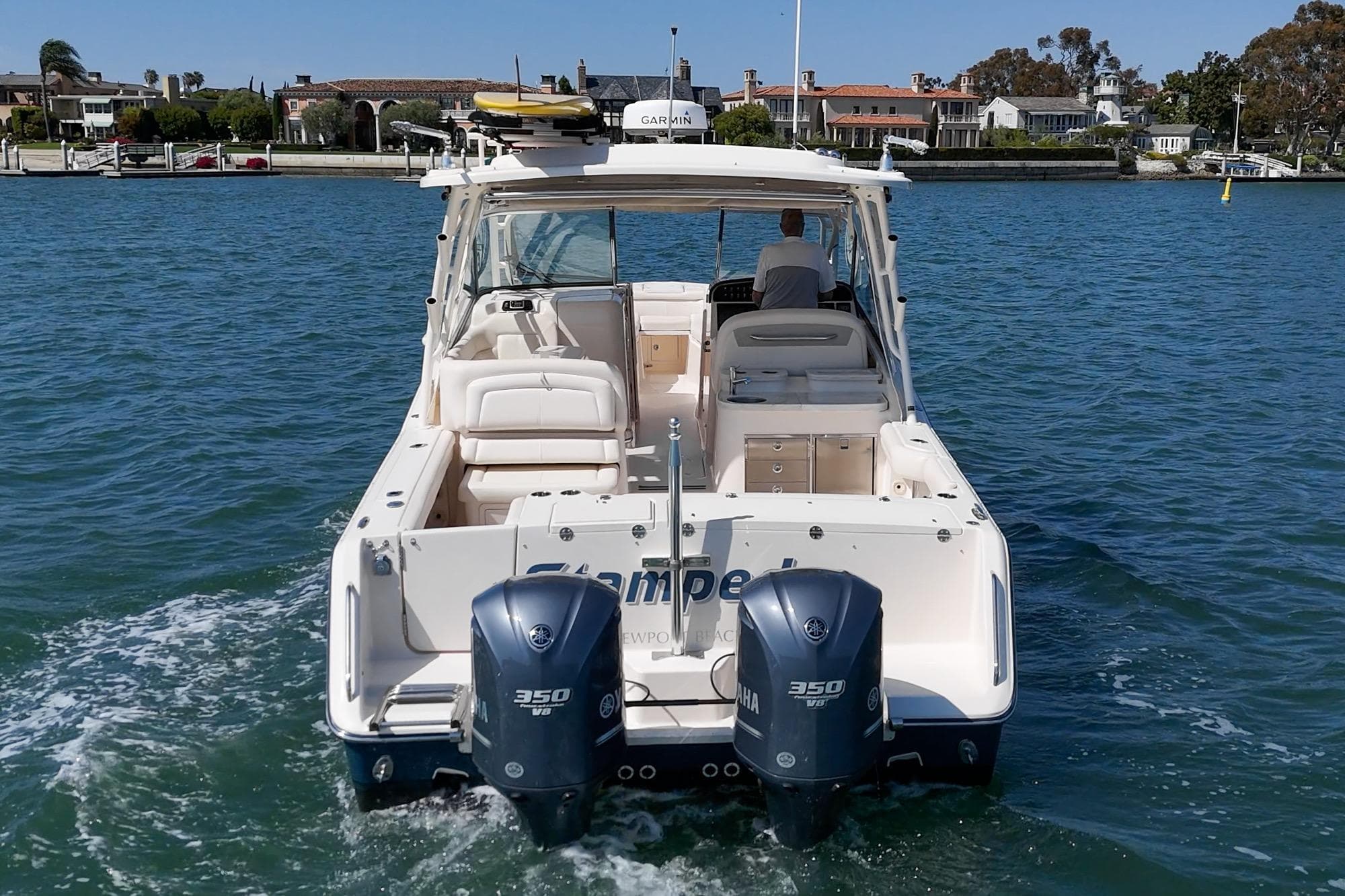 2016 Grady-White Freedom 335 boat with twin Yamaha 350 engines on the water.