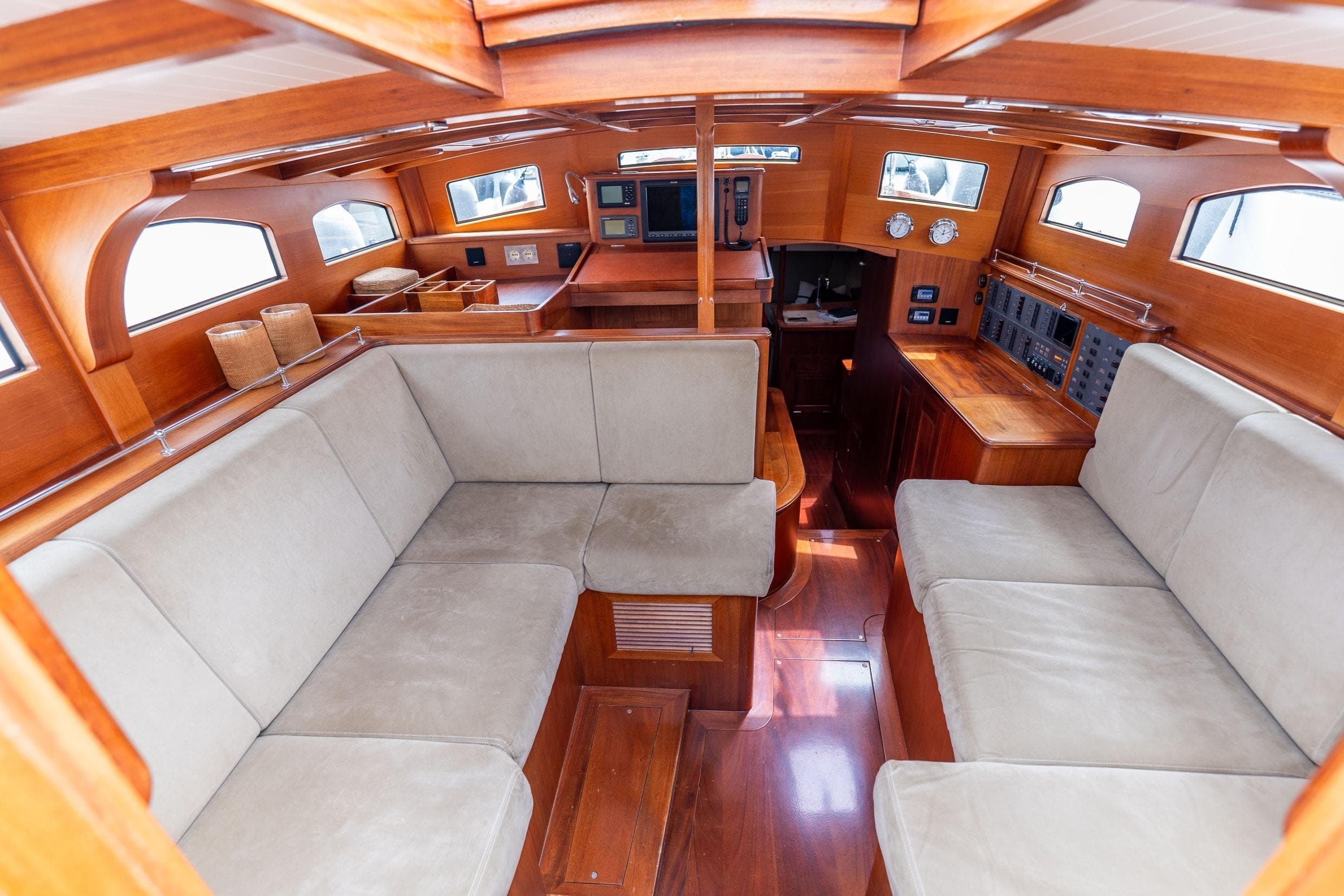 Luxurious interior of 2012 Spirit Yachts 60DH, featuring elegant woodwork and comfortable seating.
