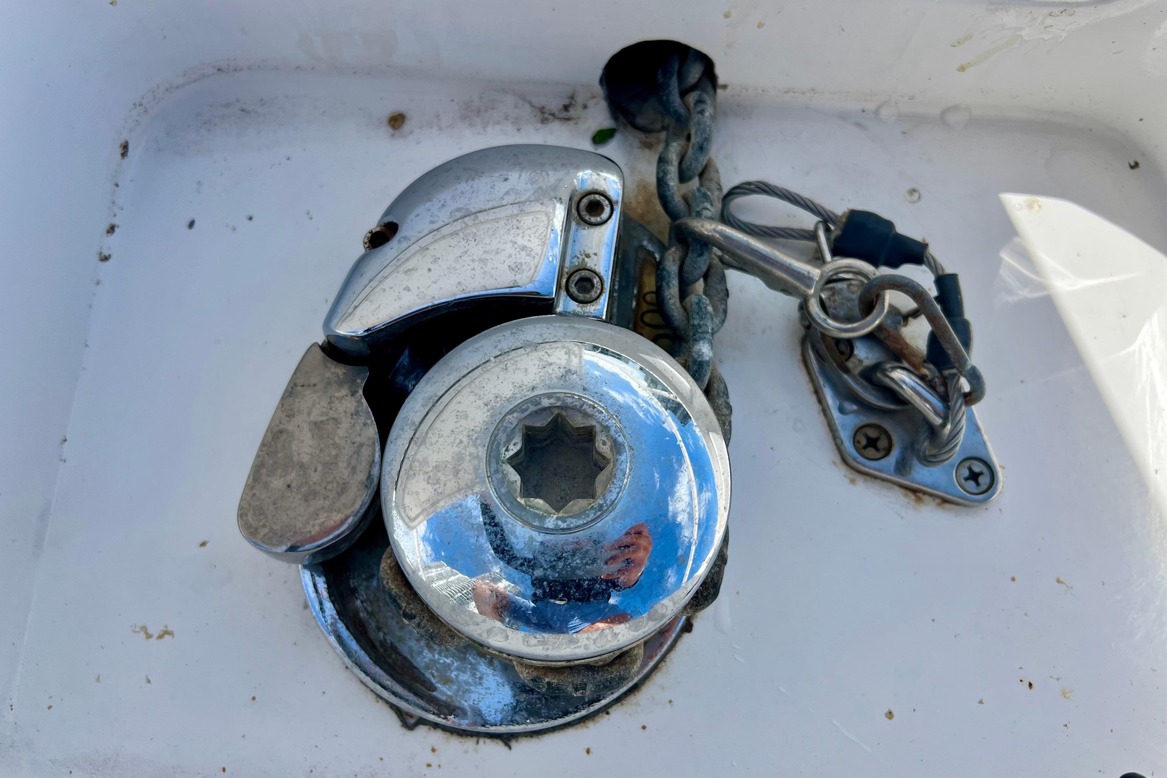 Chrome boat winch and chain on 2011 Deep Impact 36 Open.