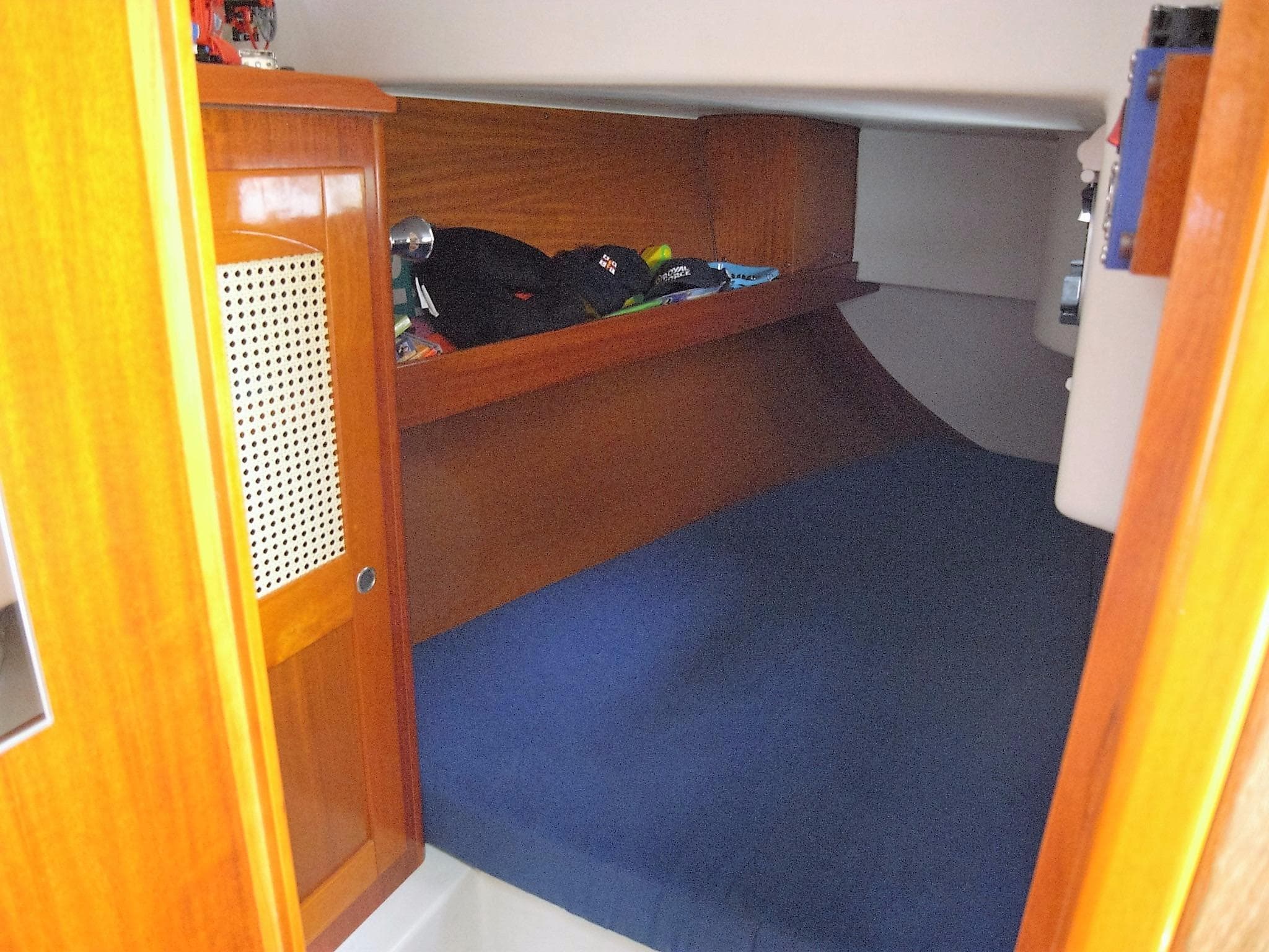 Interior of a 2003 Hanse 341 yacht with wooden furnishings.