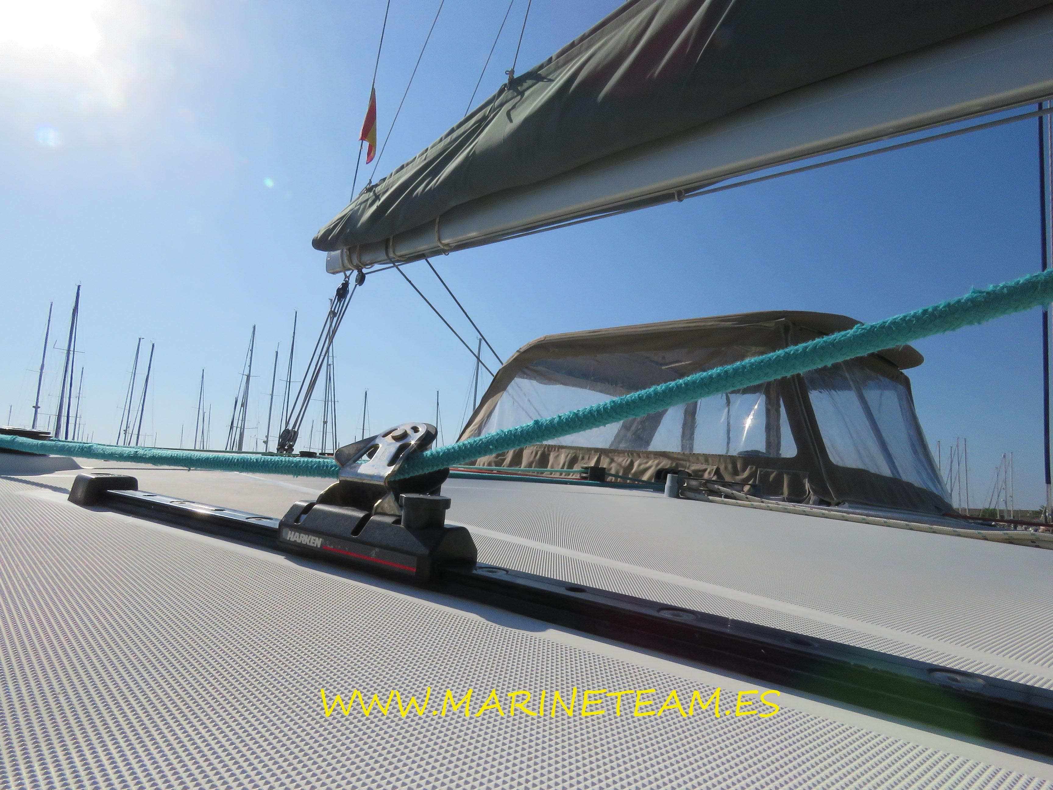 Lagoon 400 S2 catamaran deck view, showcasing rigging and sail, 2015 model.