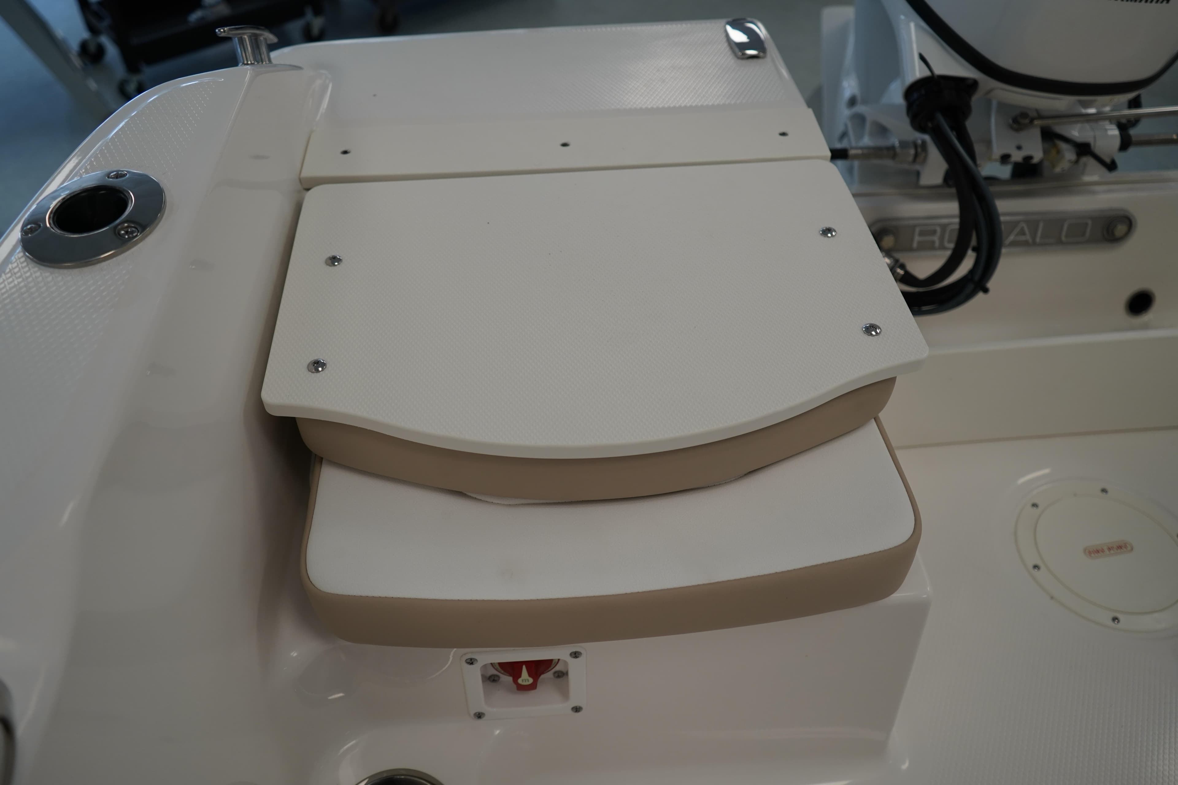 2026 Robalo R160 Center Console boat seat with storage compartment.