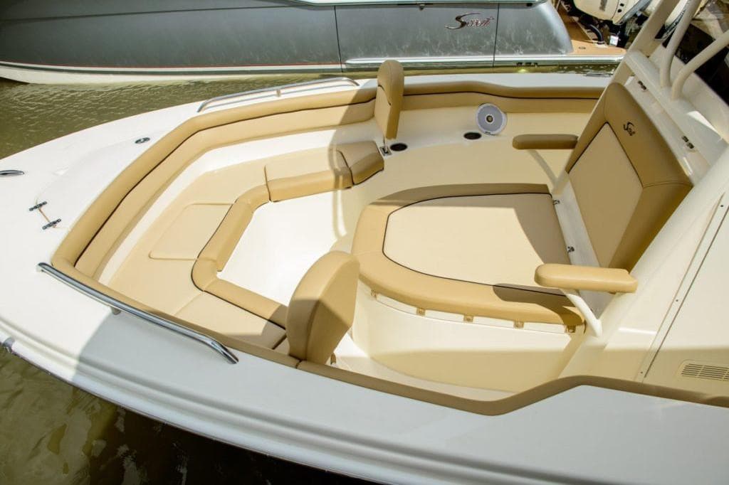 Manufacturer Provided Image: 2025 Scout 215 XSF boat with beige seating and sleek design.