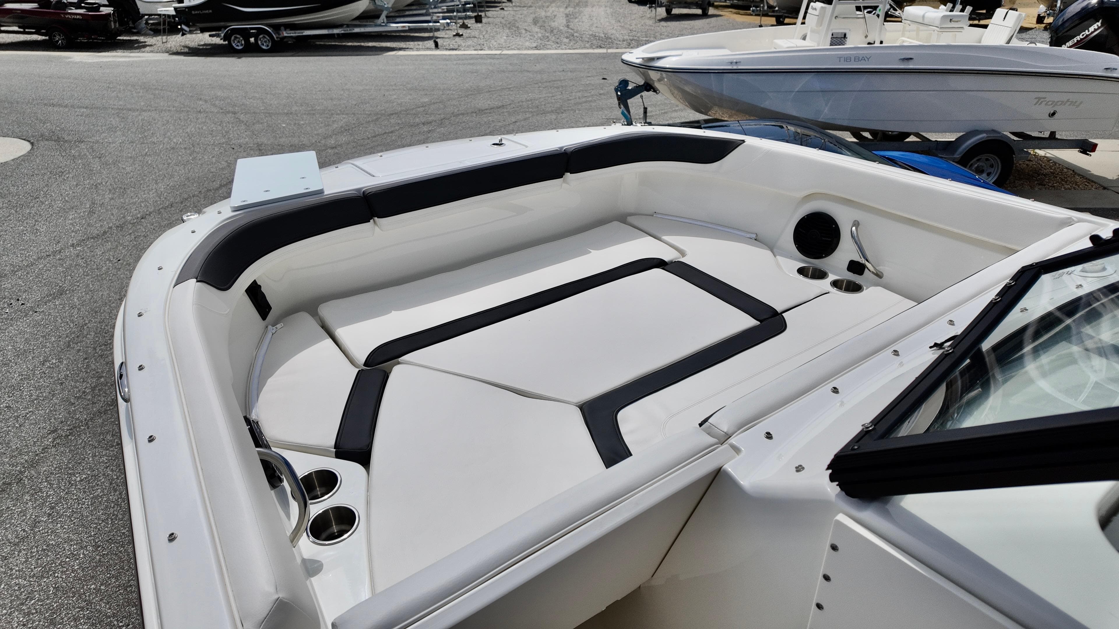 2025 Bayliner Trophy 22 Side Console boat interior with seating and cup holders.