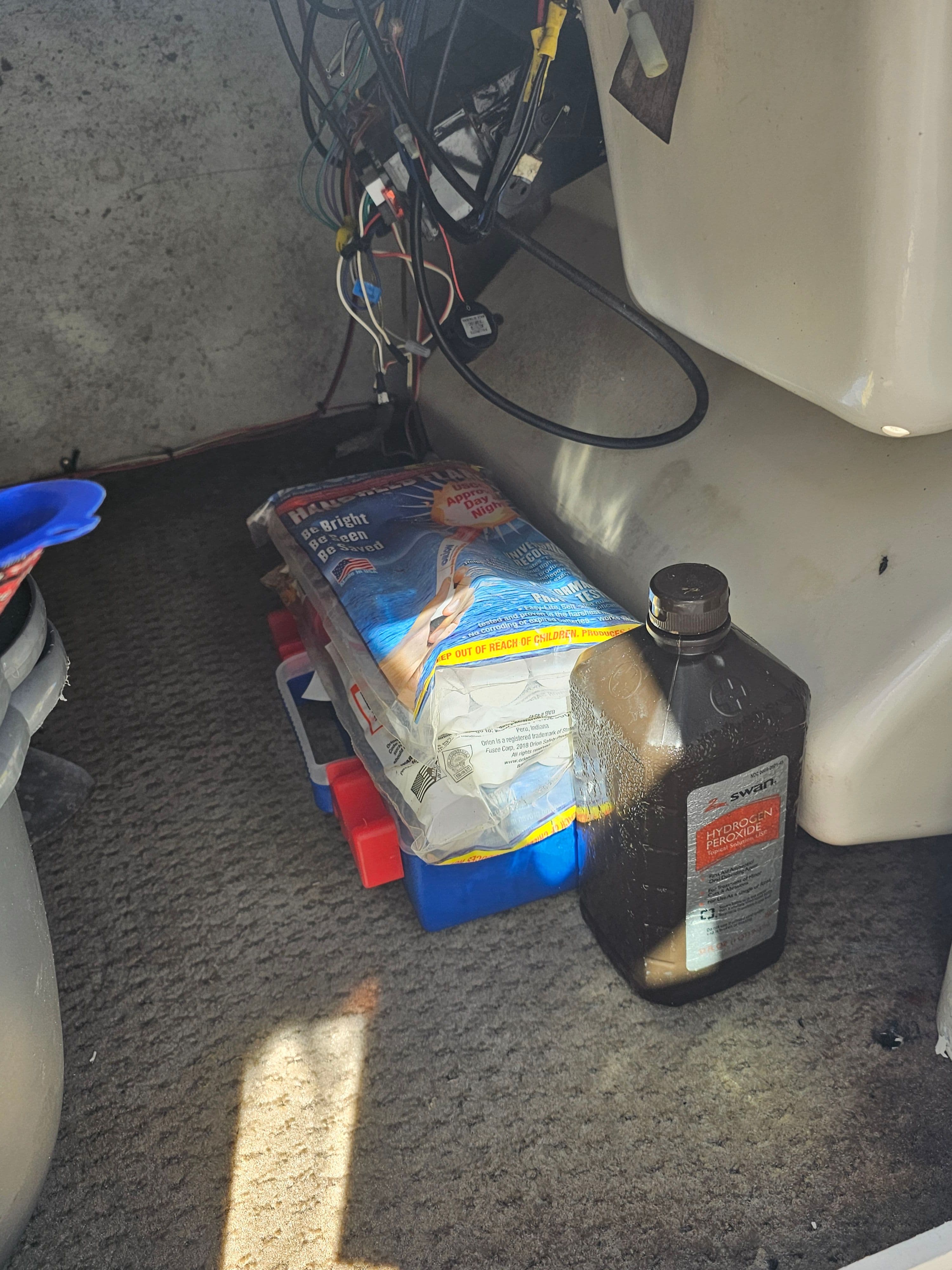 Interior of a 2002 Godfrey Hurricane Sundeck 187 boat with accessories.
